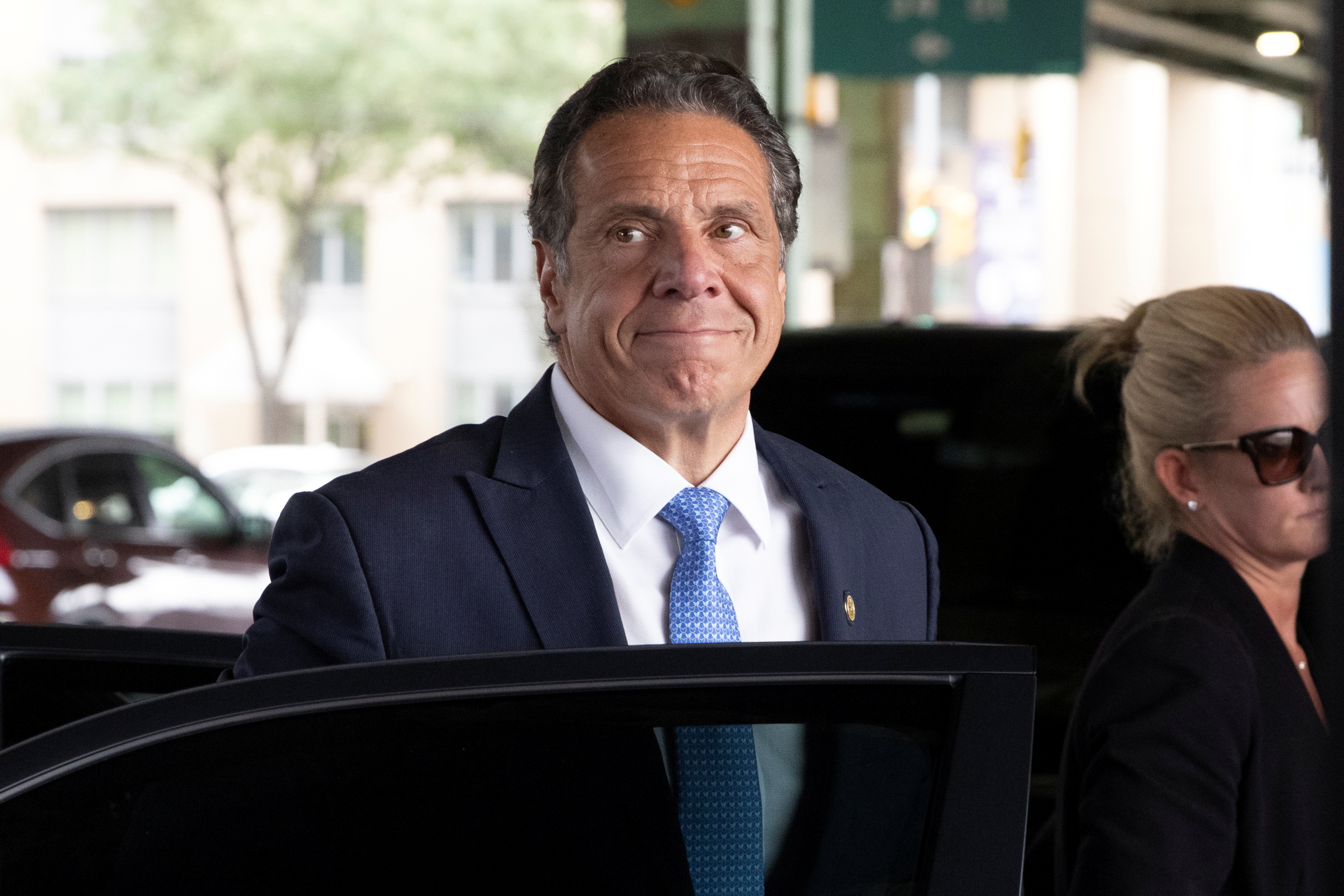 New York Governor Andrew Cuomo arrives to depart in his helicopter after announcing his resignation in Manhattan, New York City