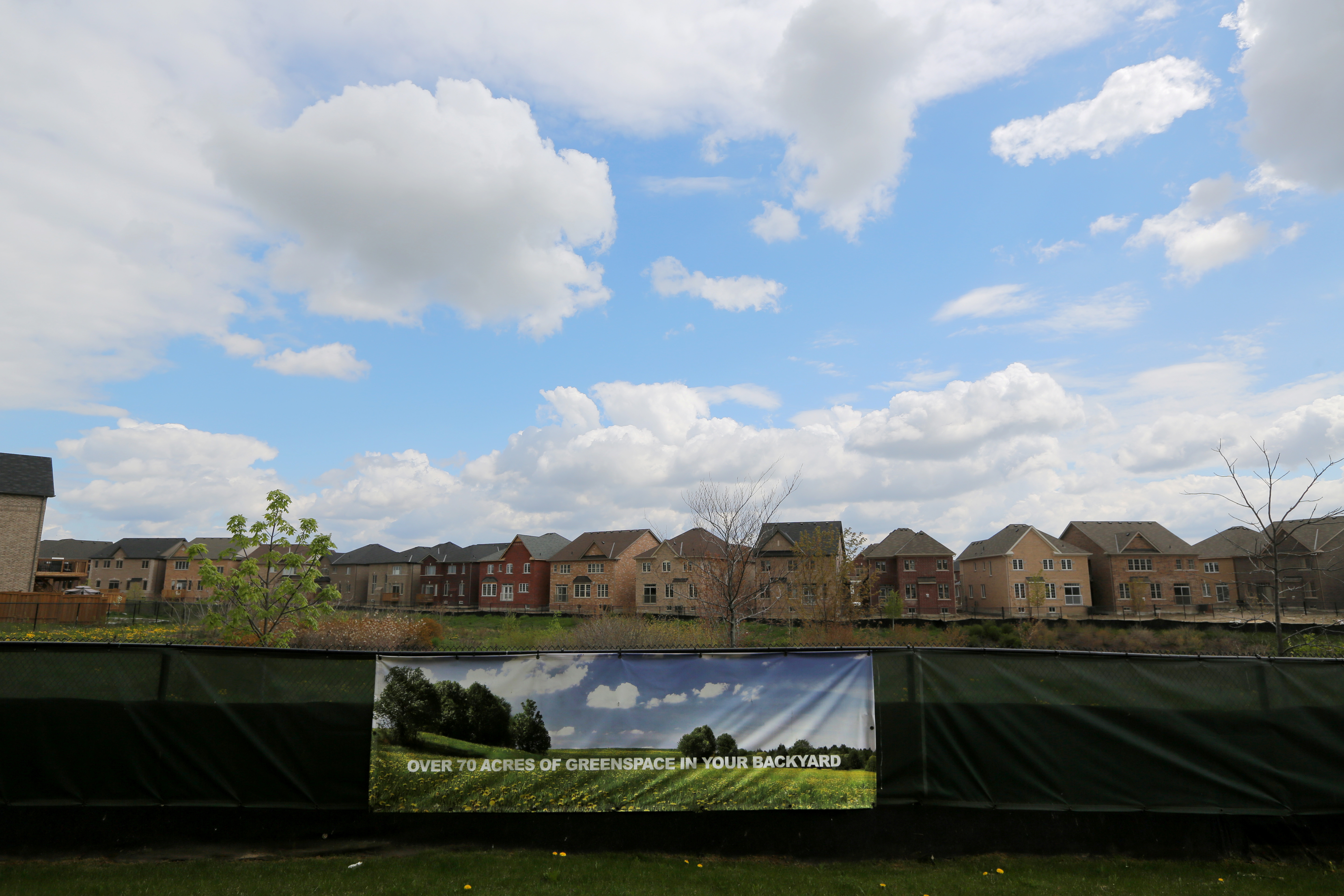 Newly built houses are seen at a subdivision near the town of Kleinburg