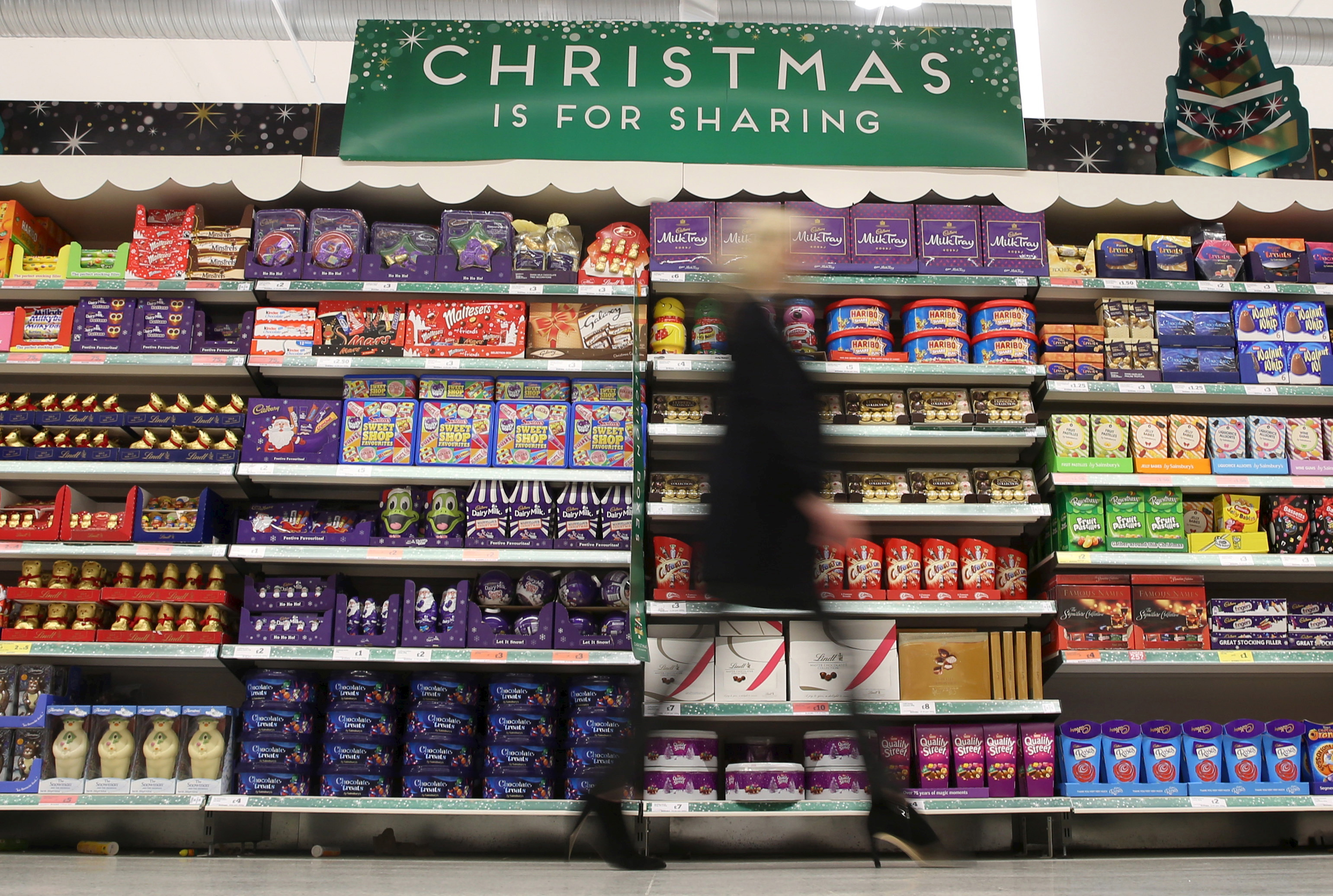 A woman shops at a Sainsbury's store in London, Britain