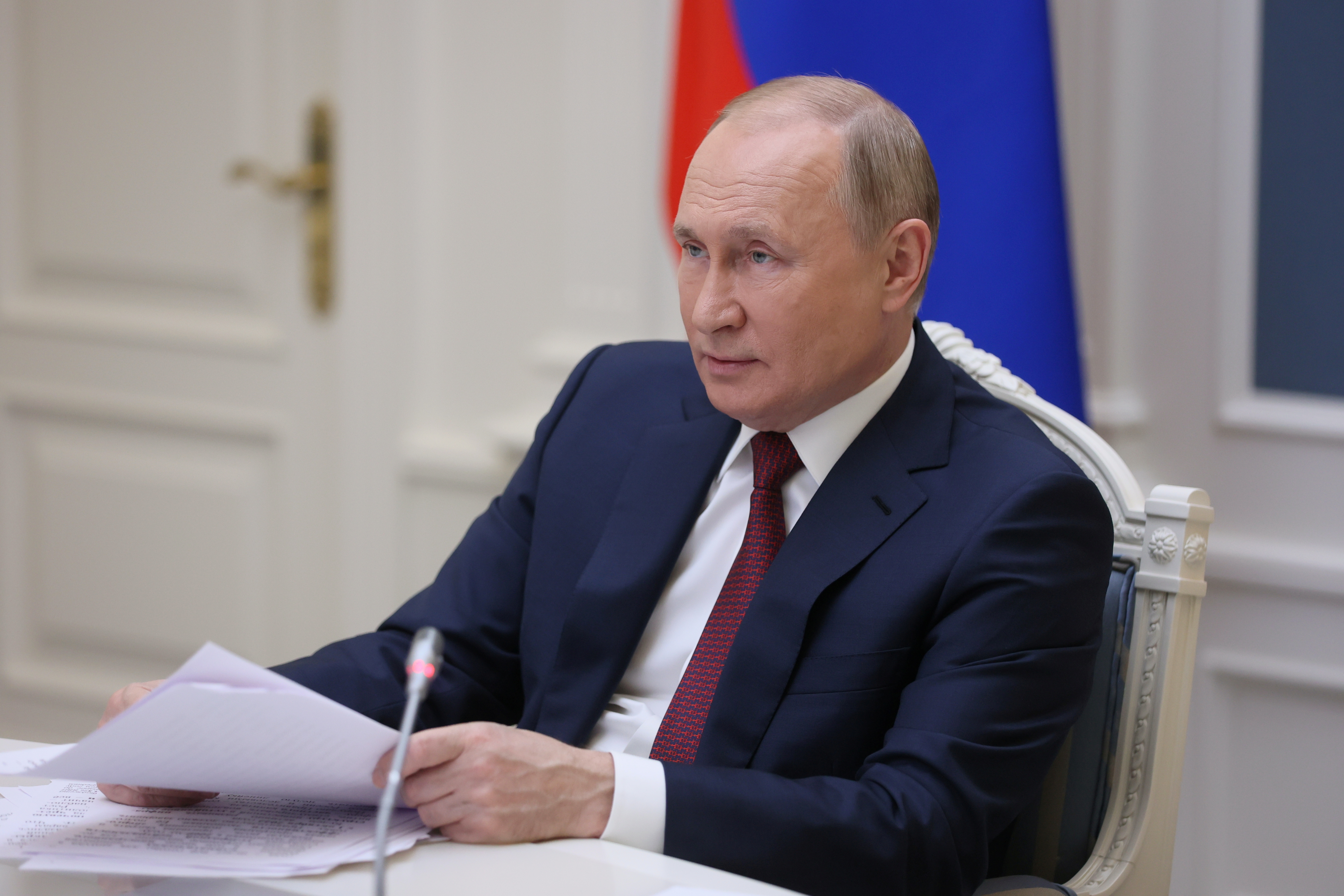 Russian President Vladimir Putin attends a session of the VTB Capital Investment Forum 