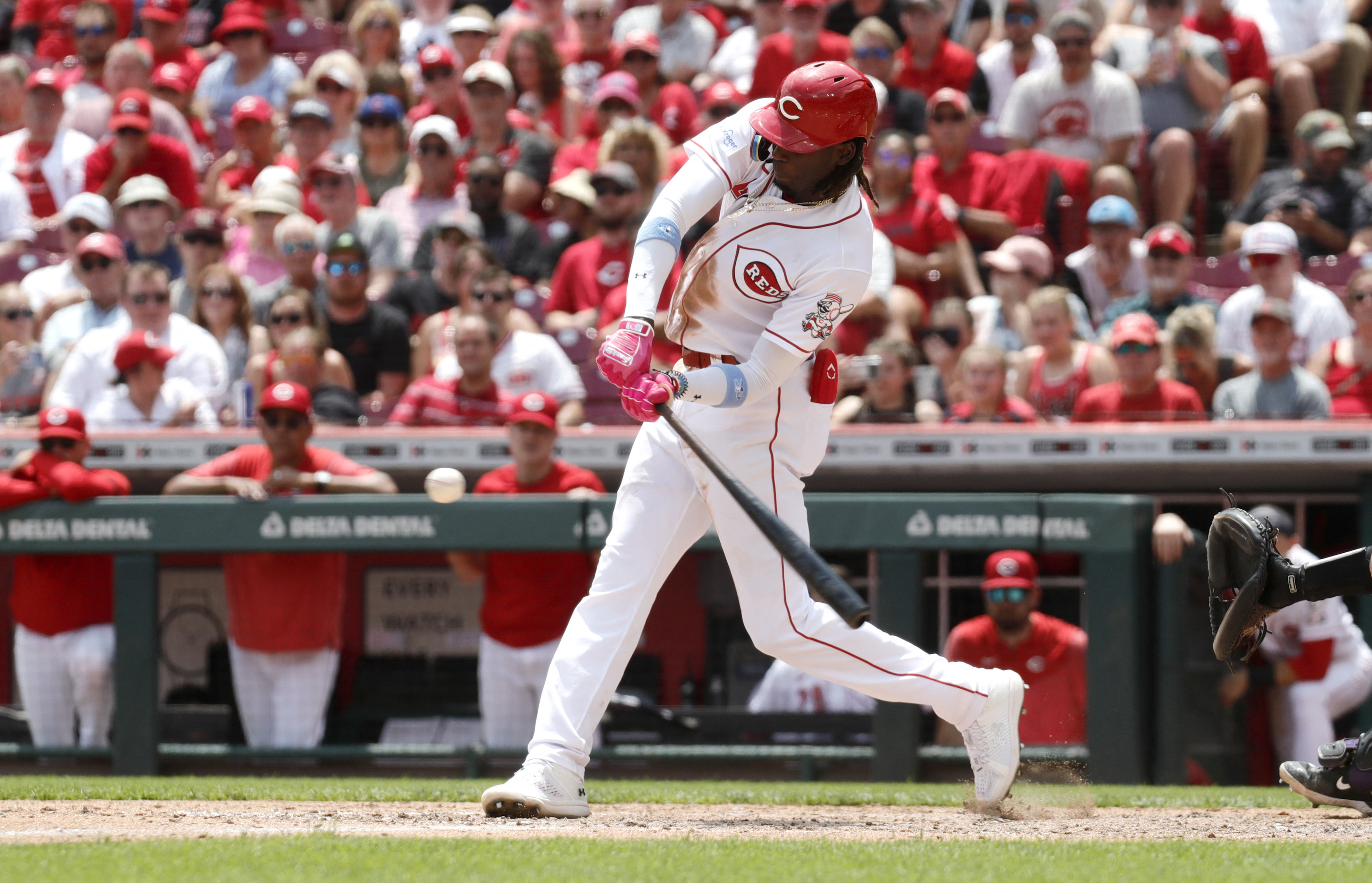 Reds beat Rockies, stretch winning streak to 11