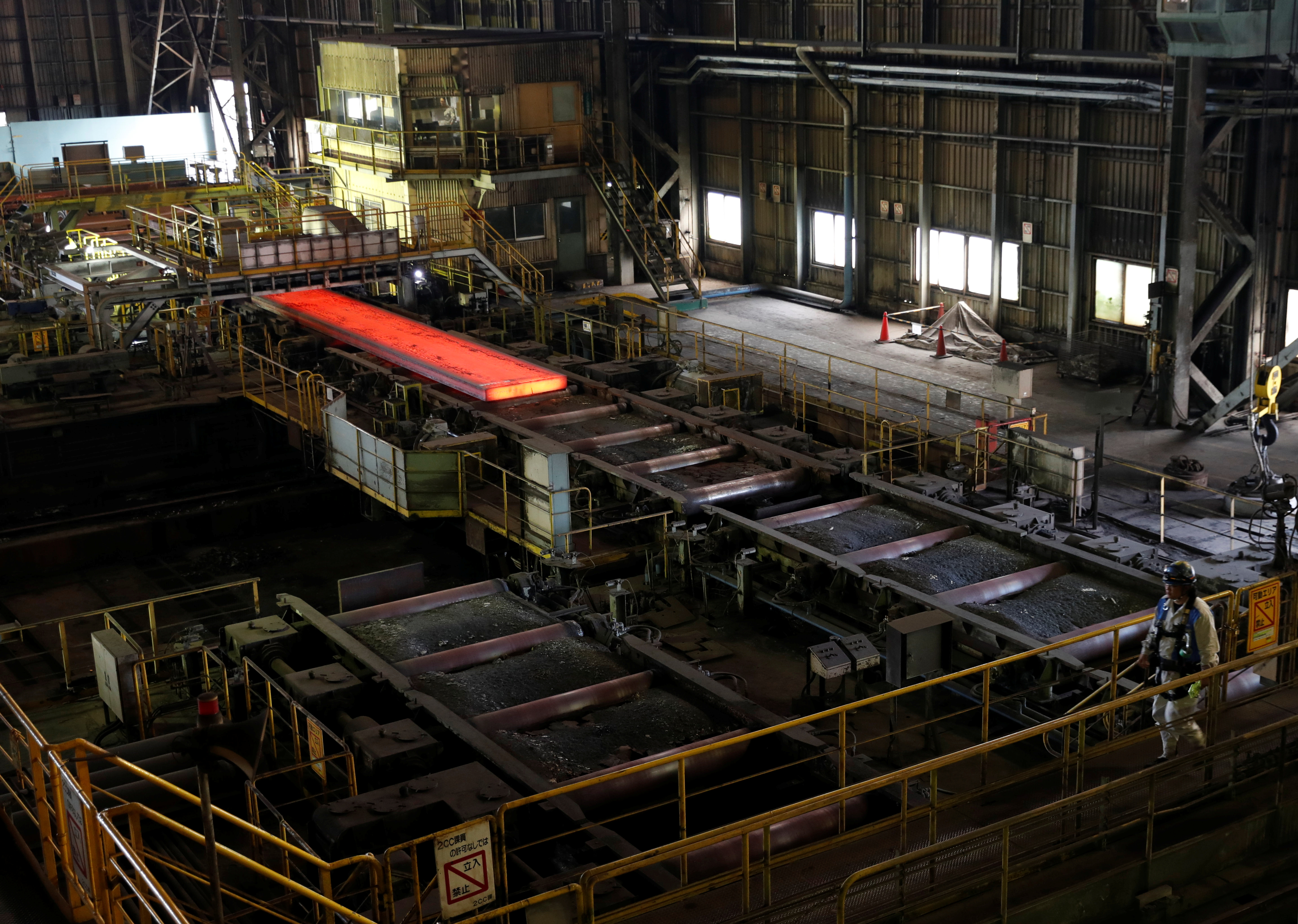 A production line of Nippon Steel & Sumitomo Metal Corp.'s Kimitsu steel plant is pictured in Kimitsu