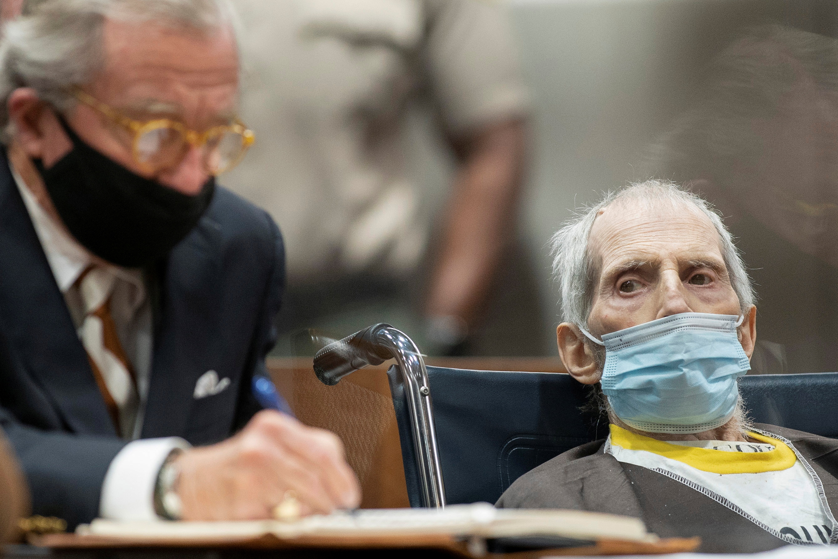 Robert Durst, seated with attorney Dick DeGuerin, was sentenced to life without possibility of parole for the killing of Susan Berman, in Los Angeles