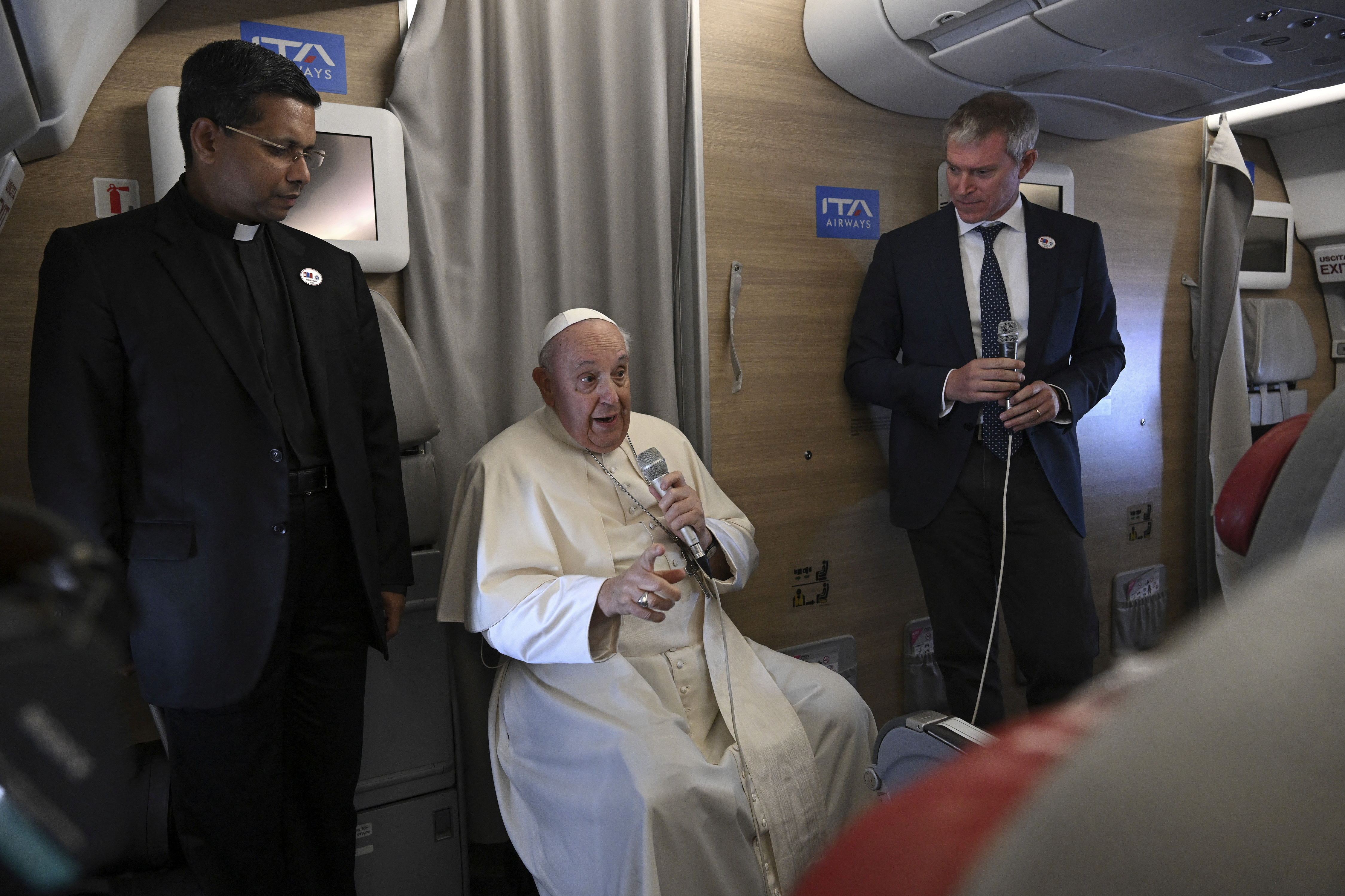 Pope Francis speaks to media on board papal plane returning from Mongolia