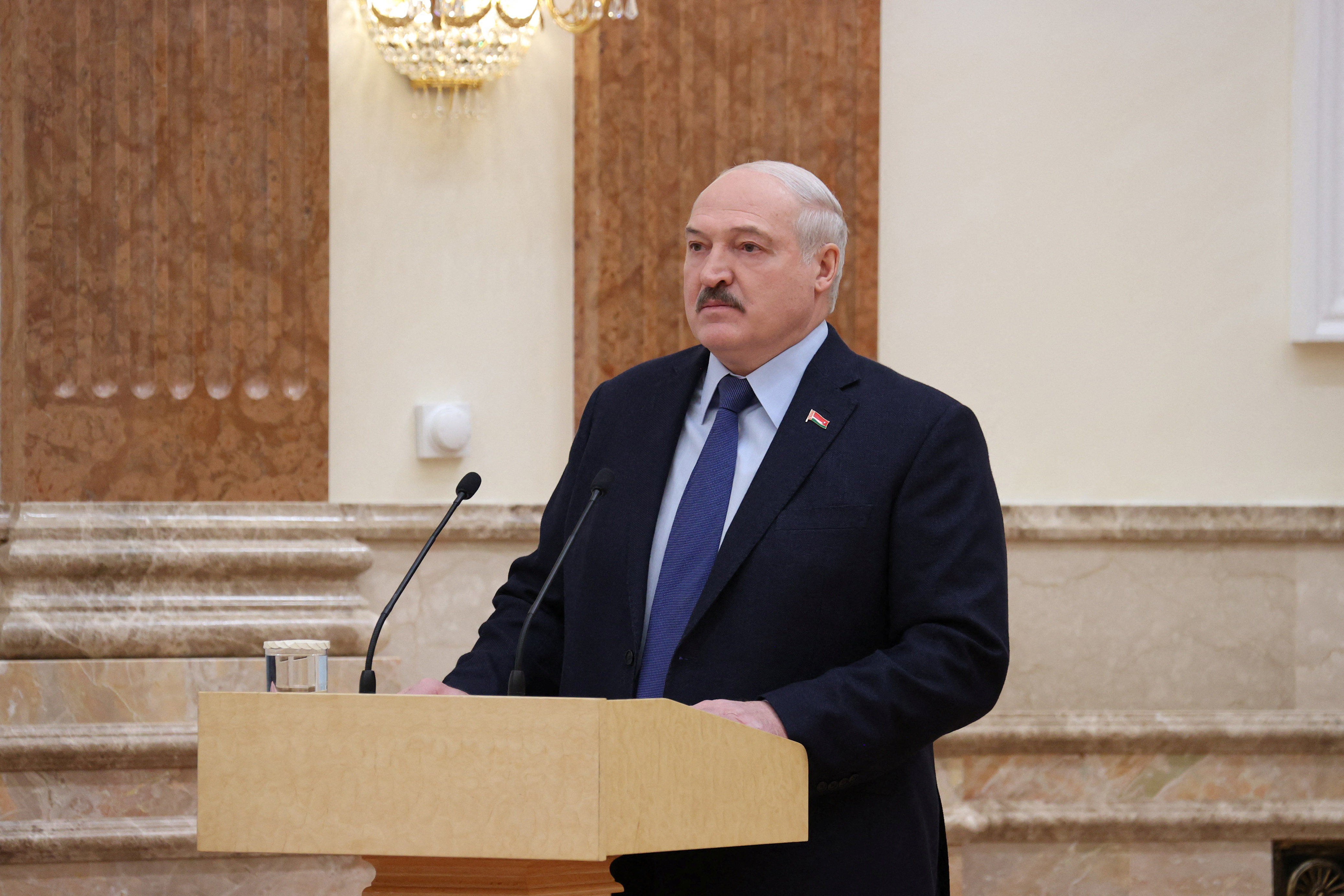 FILE PHOTO - Belarusian President Alexander Lukashenko attends a meeting in Minsk