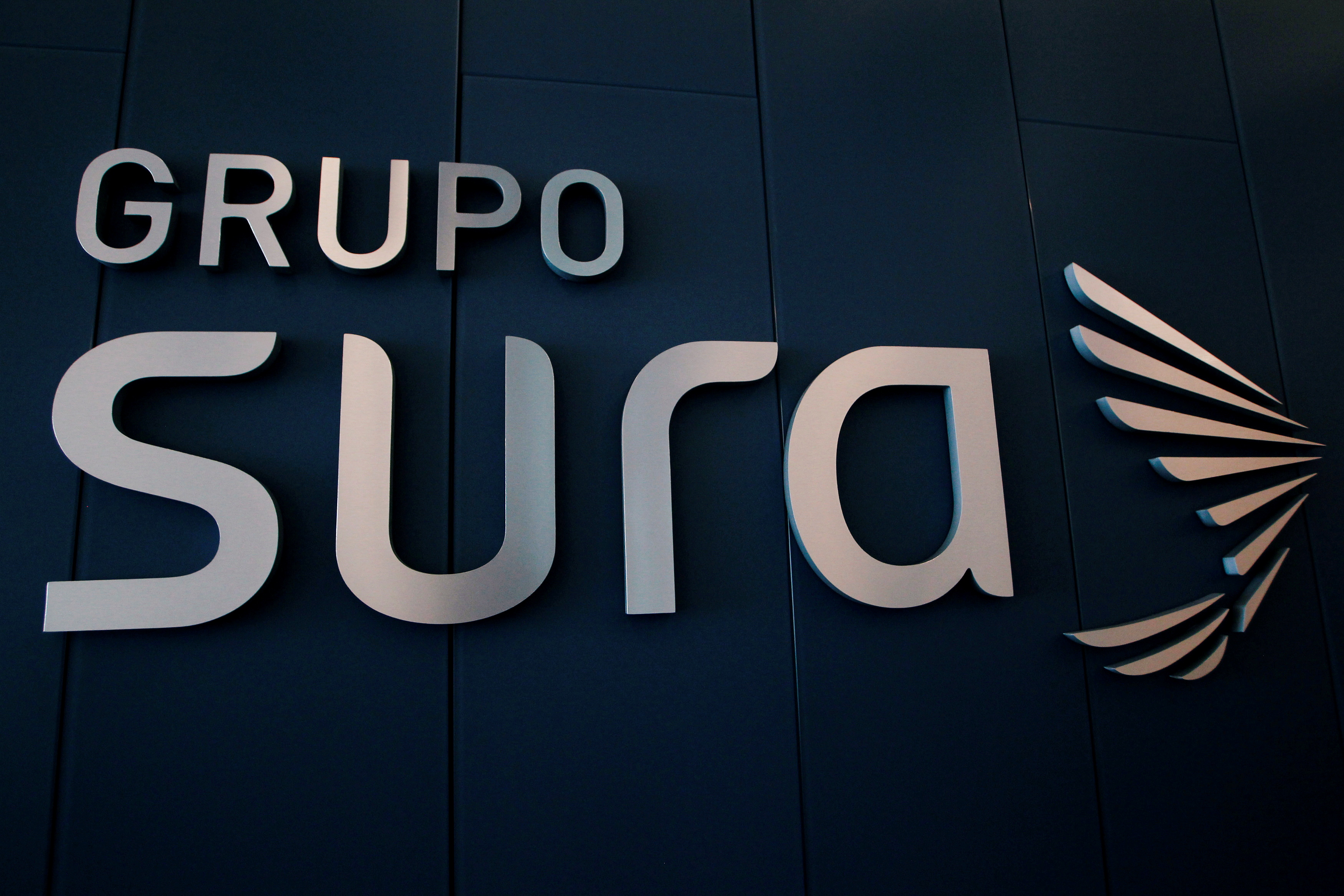 The Grupo Sura logo can be seen at its headquarters in Medellin