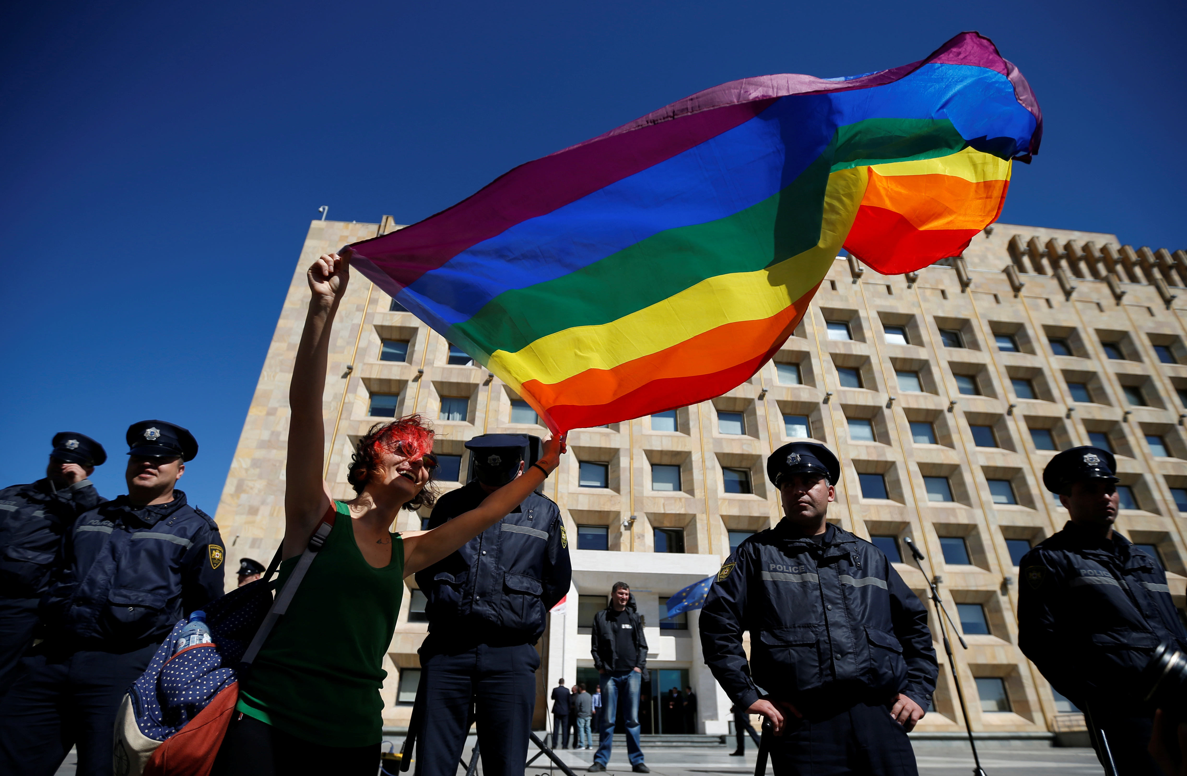 LGBT activist attends a rally against Homophobia and Transphobia in Tbilisi