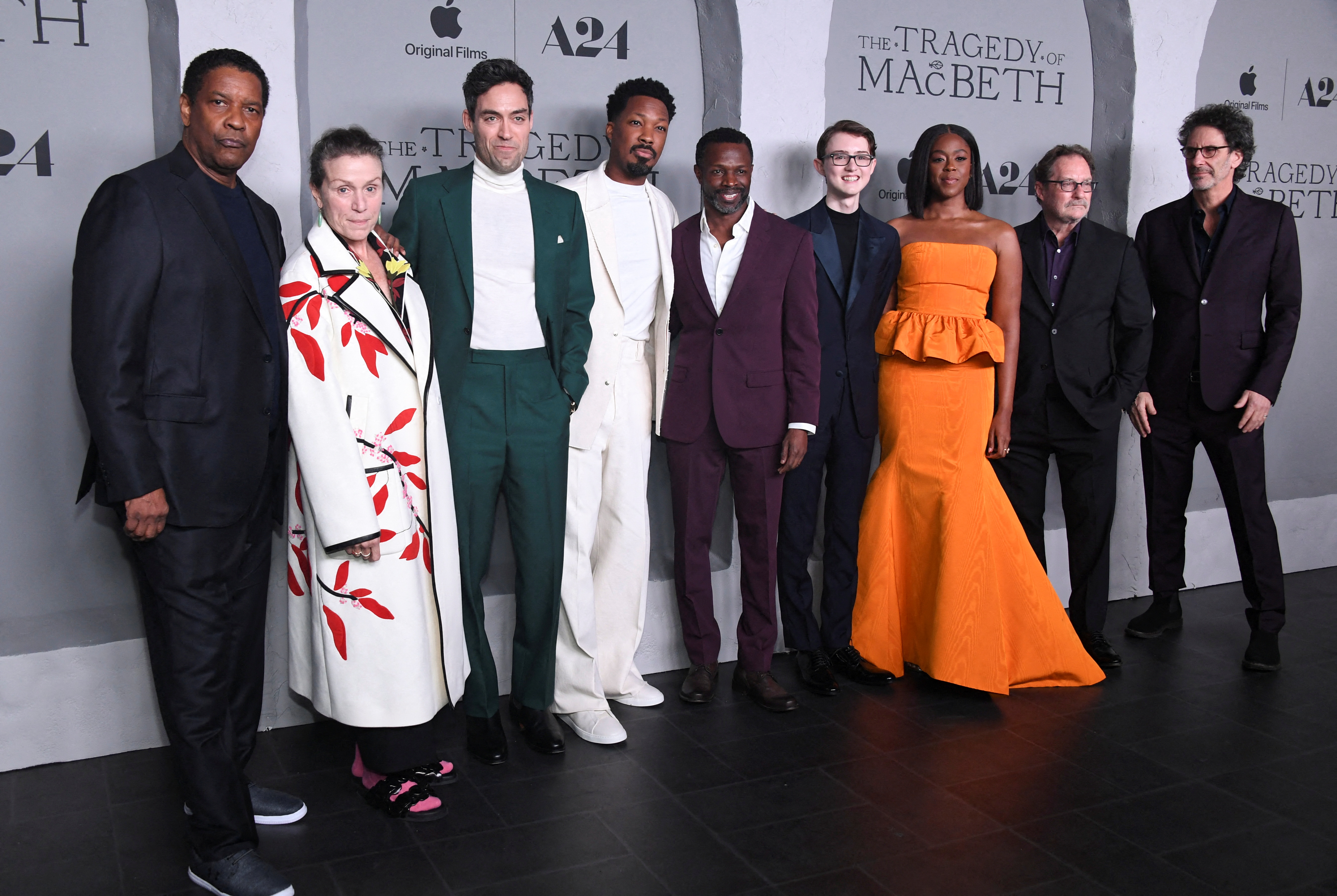 Cast members Denzel Washington, Frances McDormand, Alex Hassell, Corey Hawkins, Sean Patrick Thomas, Lucas Barker, Stephen Root, Moses Ingram and director Joel Coen attend the premiere for the film The Tragedy of Macbeth in Los Angeles, California, U.S., December 16, 2021. REUTERS/Phil McCarten