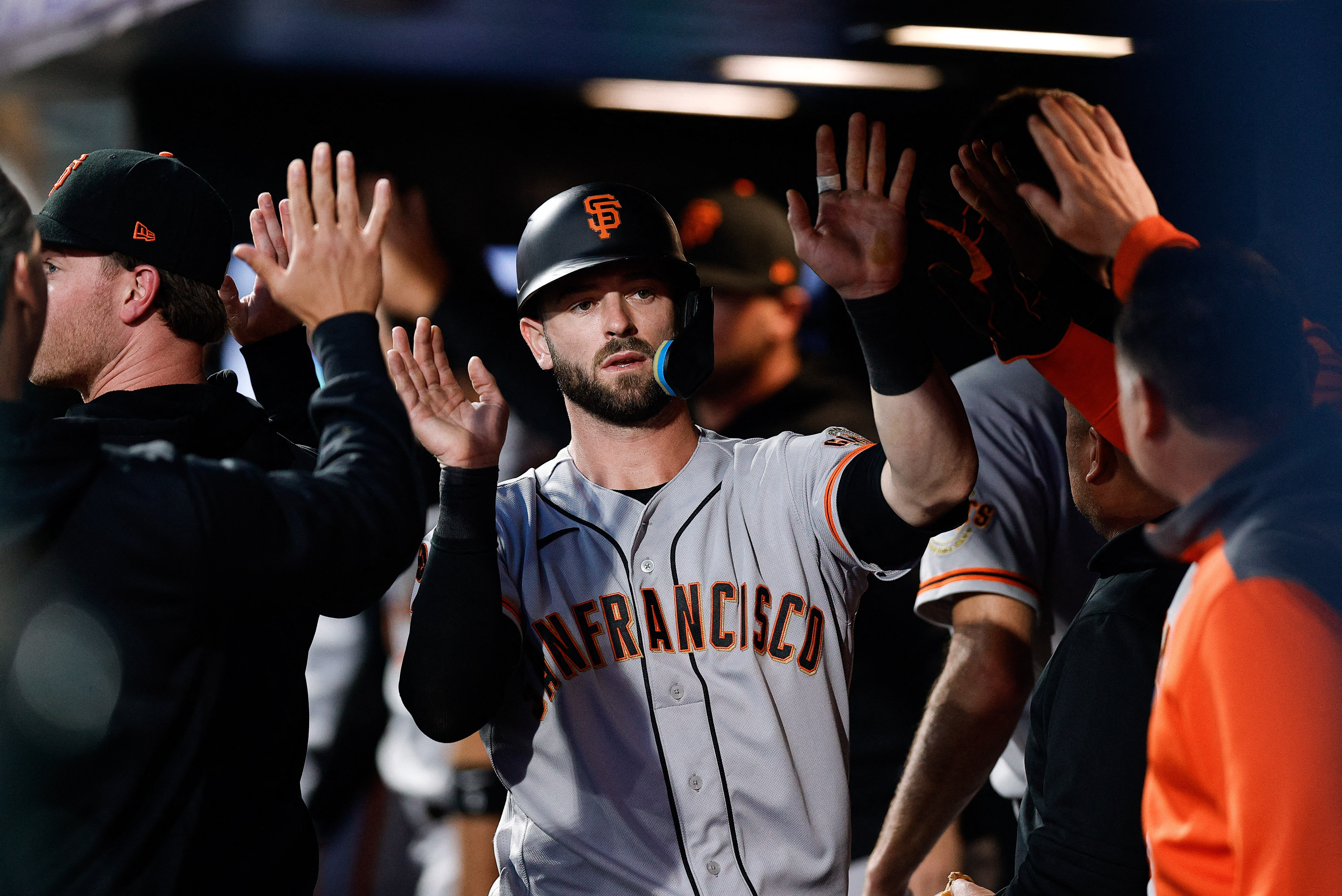 Giants overcome four-run deficit to beat Rockies