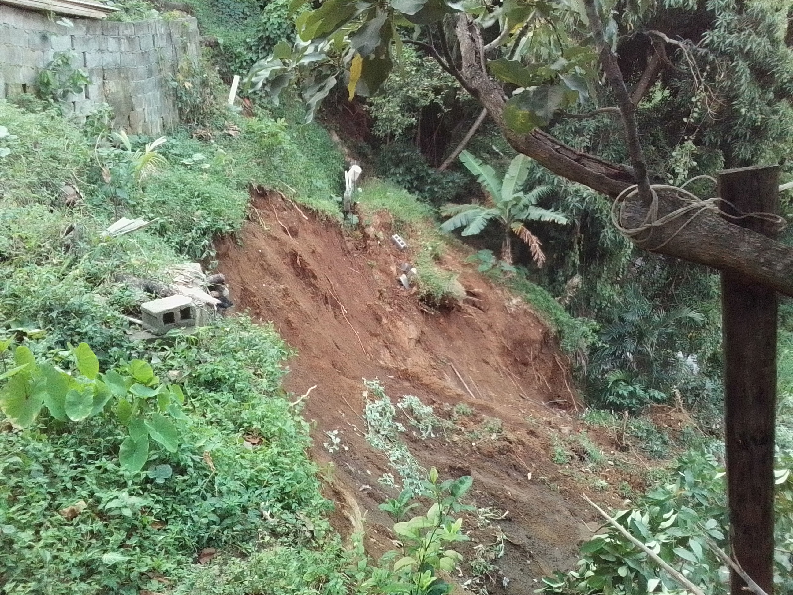 Damage from flooding and landslides is seen in Kingstown