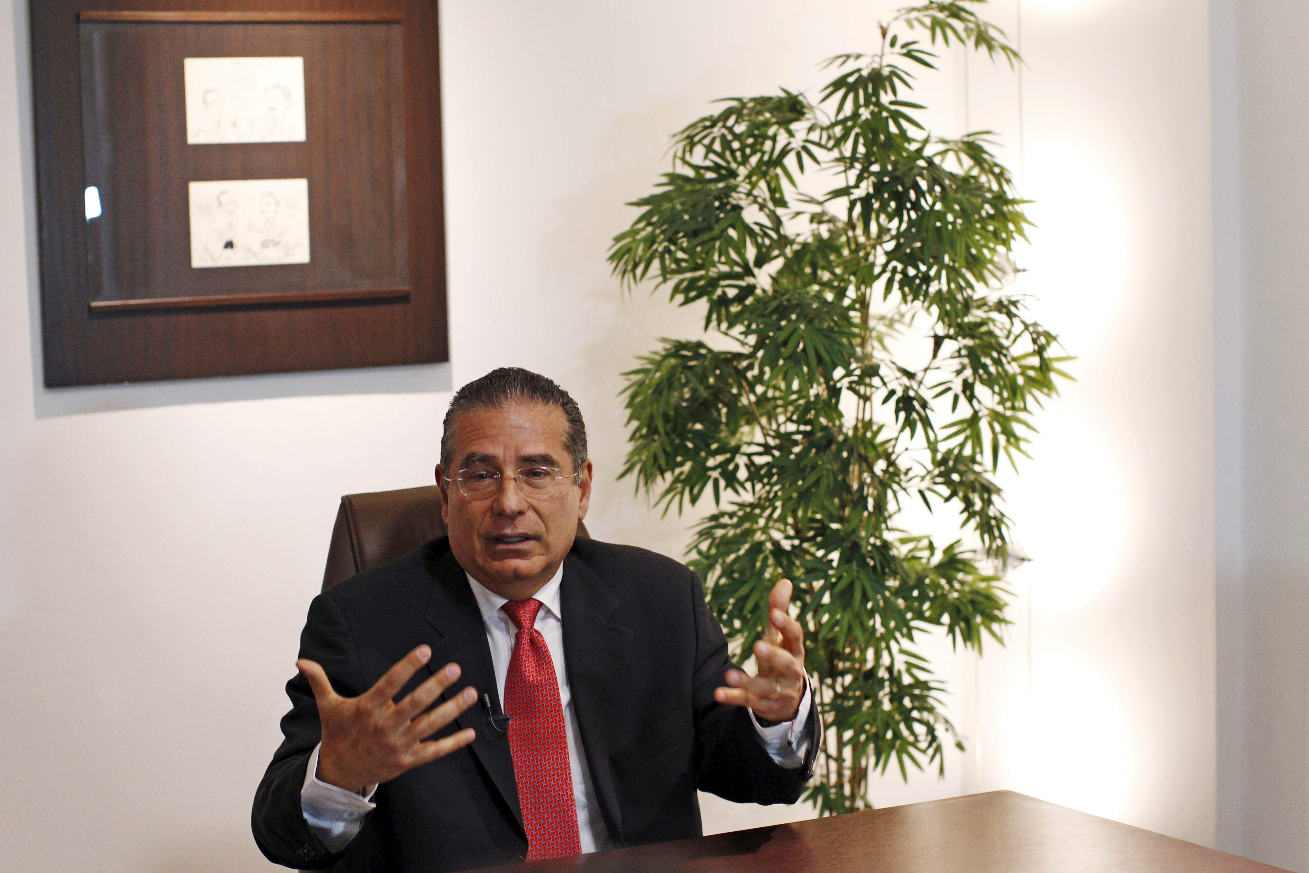 Ramon Fonseca, founding partner of law firm Mossack Fonseca, speaks during an interview with Reuters at his office in Panama City