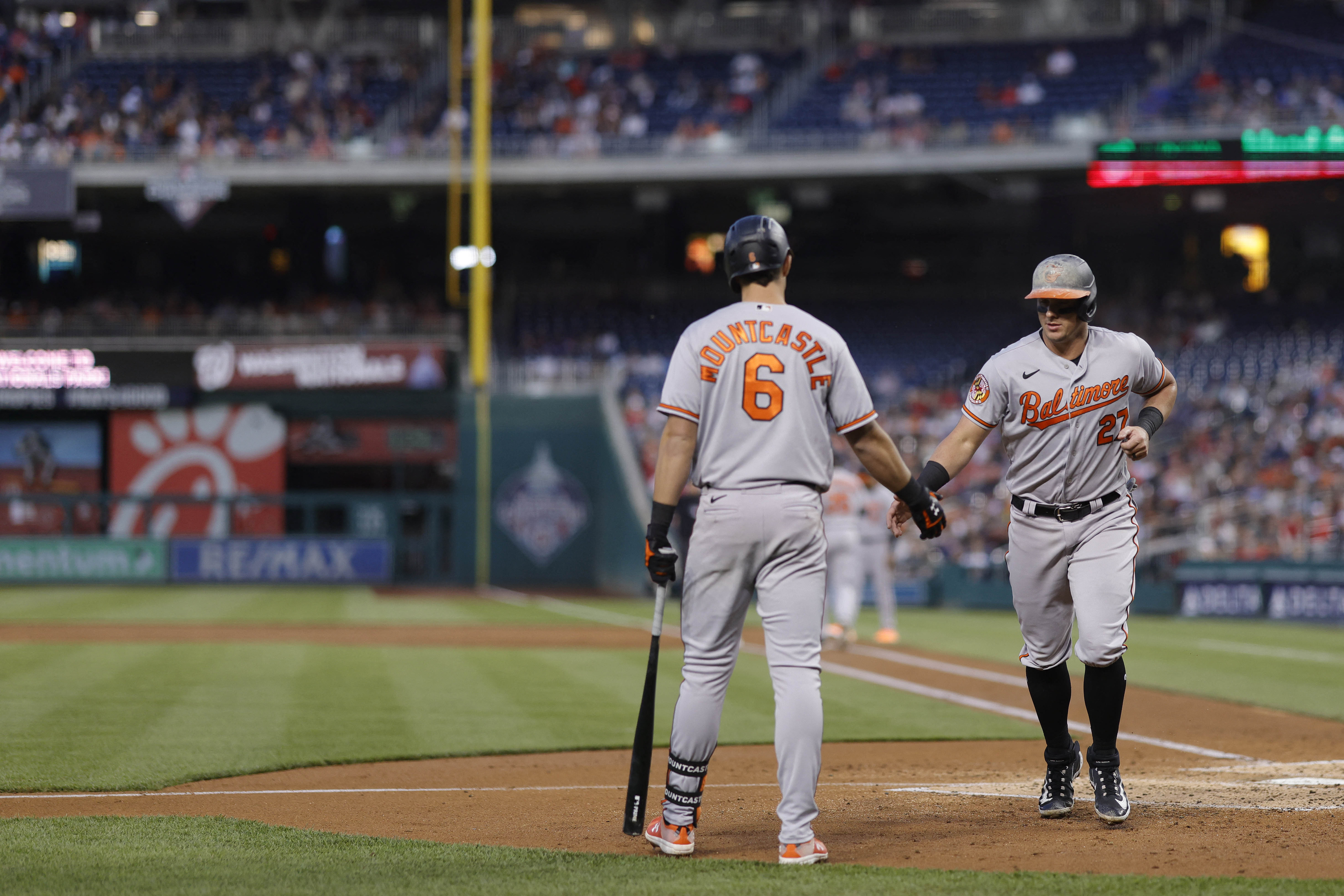 Adam Frazier homers off the bench and Kyle Bradish cruises in return as  Orioles shut out Nationals again, 4-0