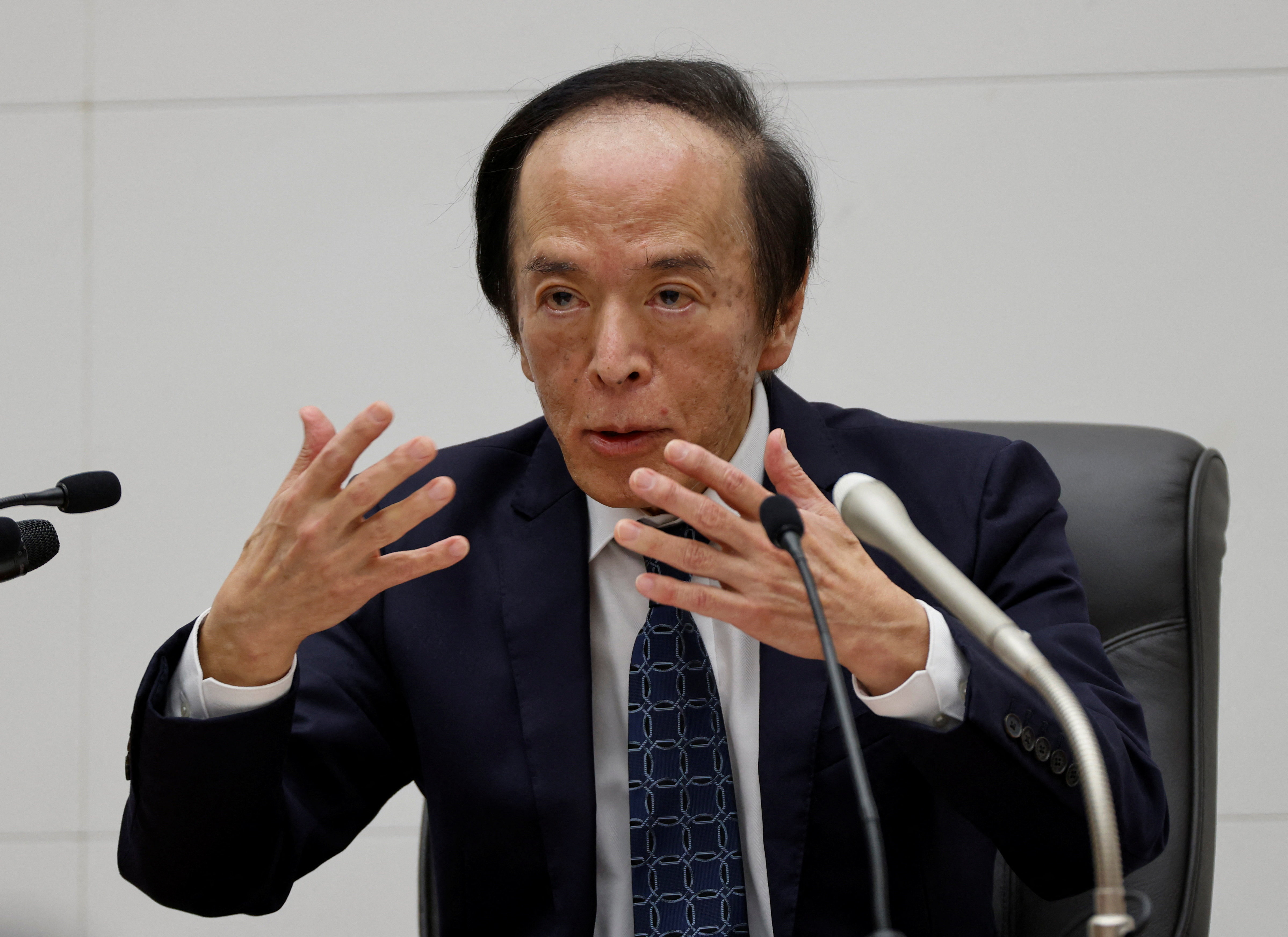 見通し実現なら経済・物価の改善に応じ引き続き利上げ＝日銀総裁