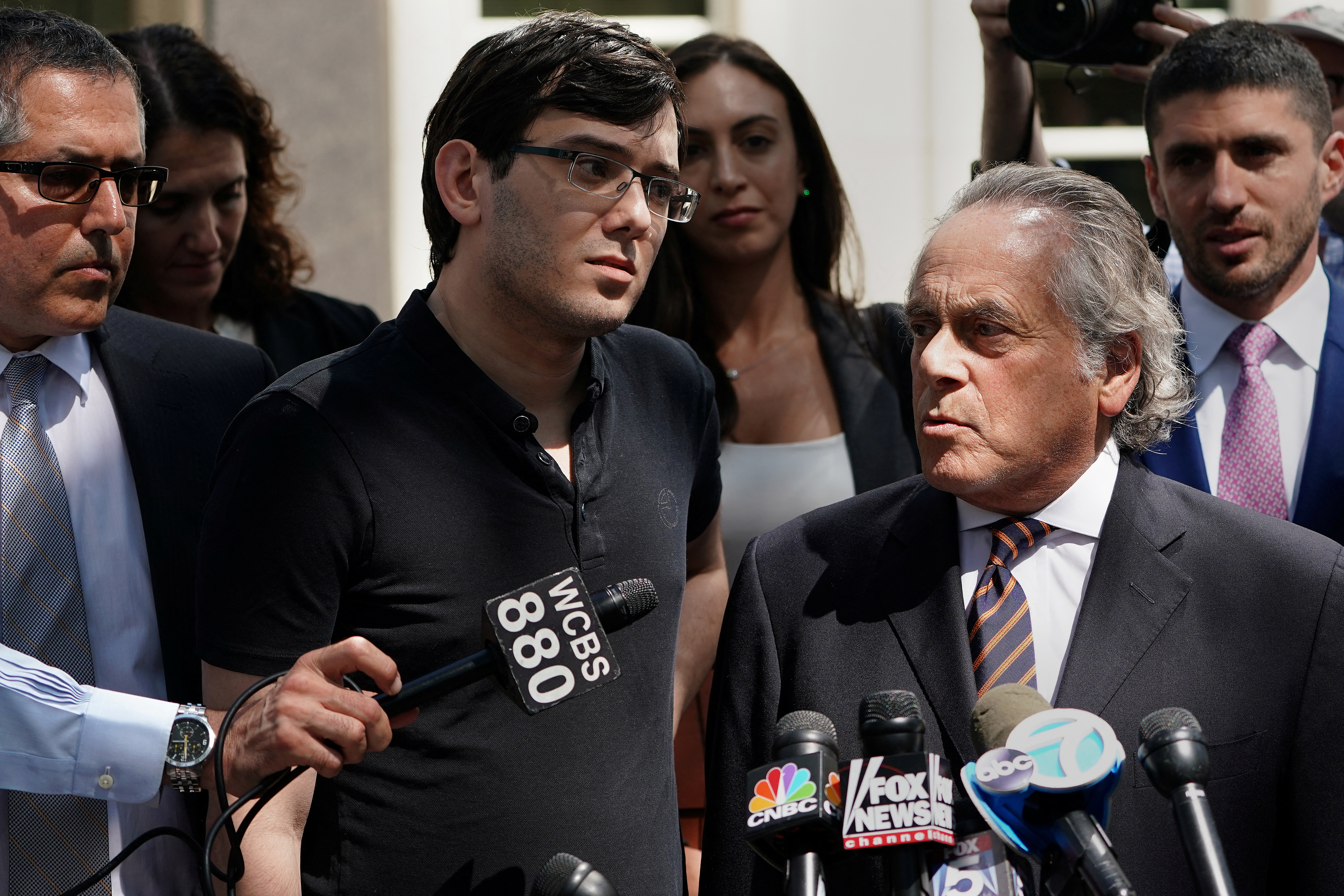 Former drug company executive Martin Shkreli stands with his attorney Benjamin Brafman after exiting U.S. District Court upon being convicted of securities fraud, in the Brooklyn borough of New York City, U.S., August 4, 2017. REUTERS/Carlo Allegri