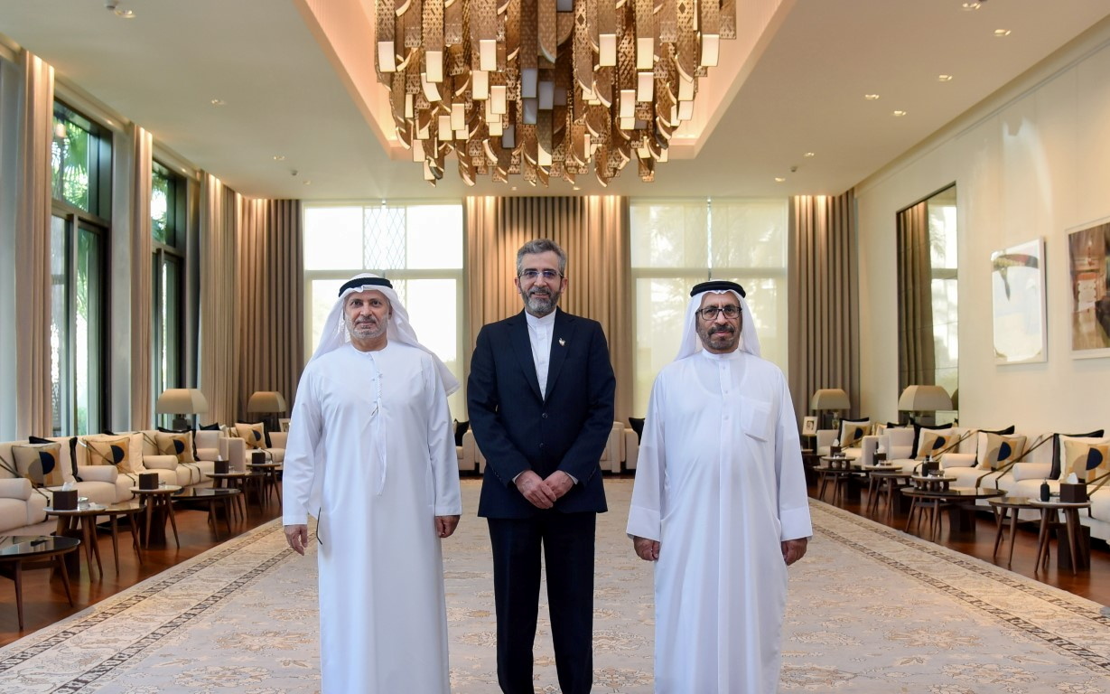 Iran's top nuclear negotiator Ali Bagheri Kani poses for a photo with diplomatic adviser to the UAE's President, Anwar Gargash, and Emirati Minister of State for Foreign Affairs Khalifa Shaheen Almarar, in Dubai