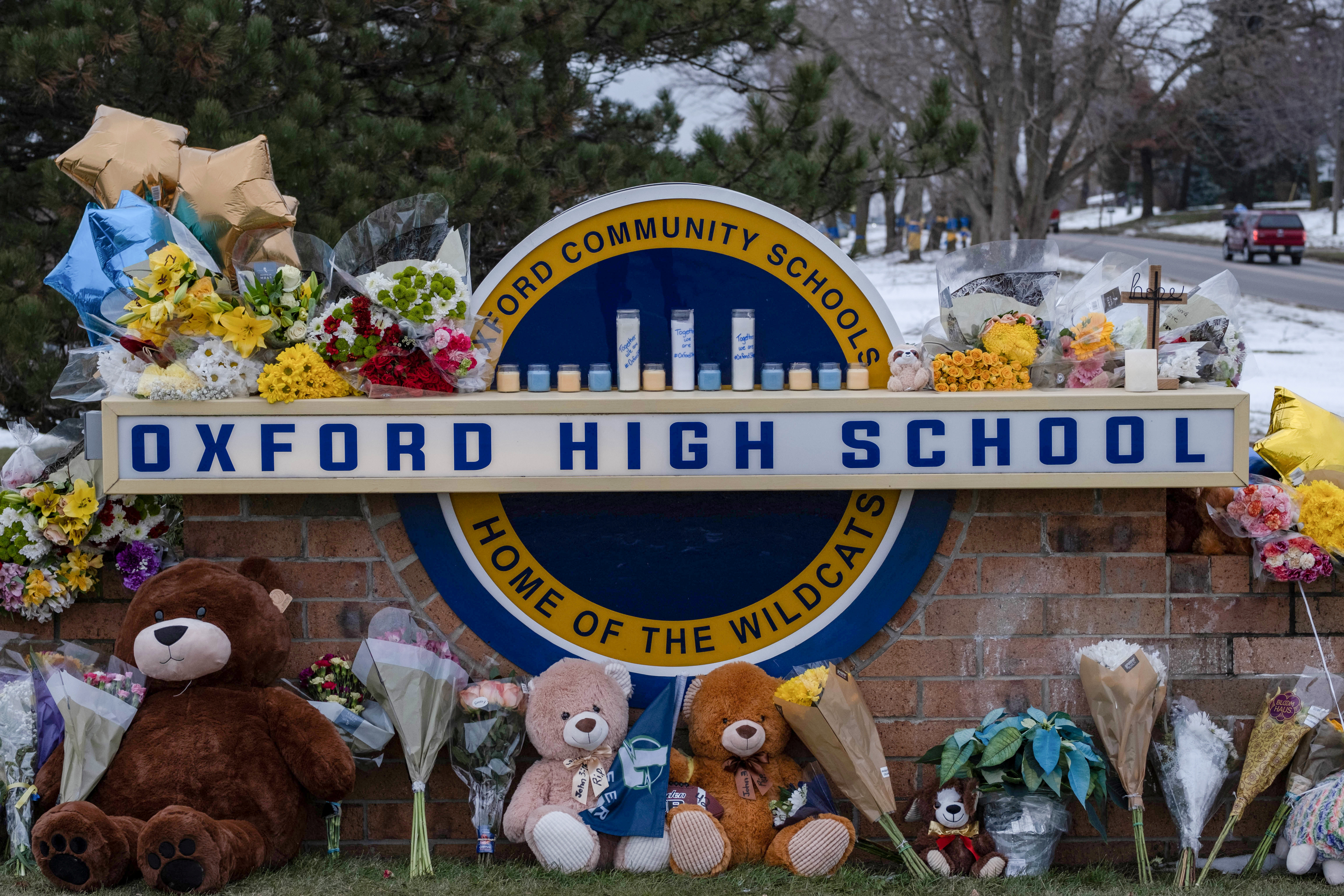A memorial is seen at Oxford High school, a day after a shooting that left four dead and eight injured, in Oxford, Michigan. December 1, 2021.  REUTERS/Seth Herald