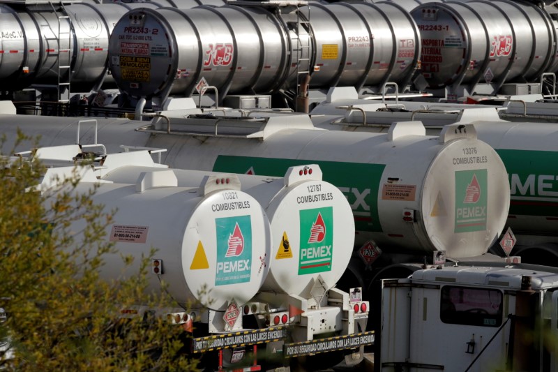 Tanker trucks are pictured at Mexican state oil firm Pemex's Cadereyta refinery in Cadereyta, on the outskirts of Monterrey, Mexico, December 10, 2020. REUTERS/Daniel Becerril/File Photo