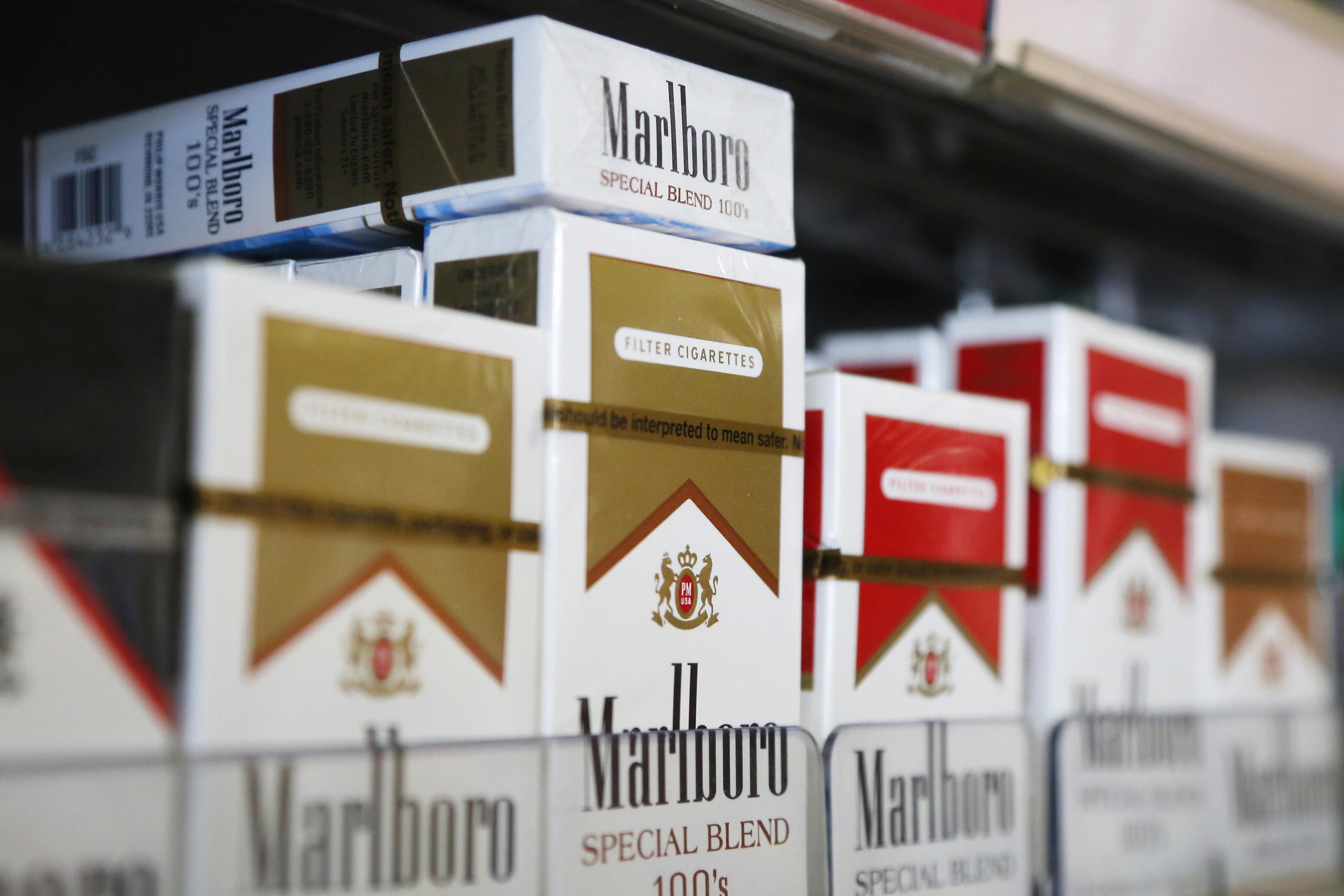 Packs of Marlboro cigarettes are displayed for sale at a convenience store in Somerville, Massachusetts July 17, 2014.