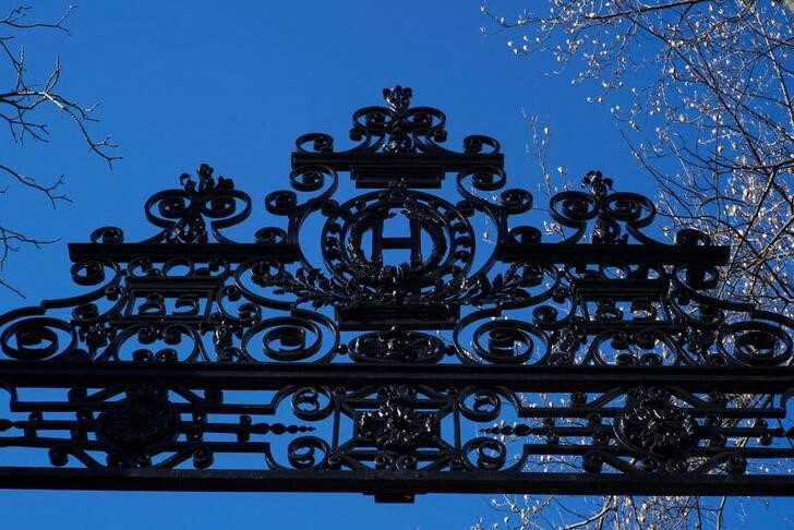 An "H" marks a gate into Harvard Yard at Harvard University in Cambridge