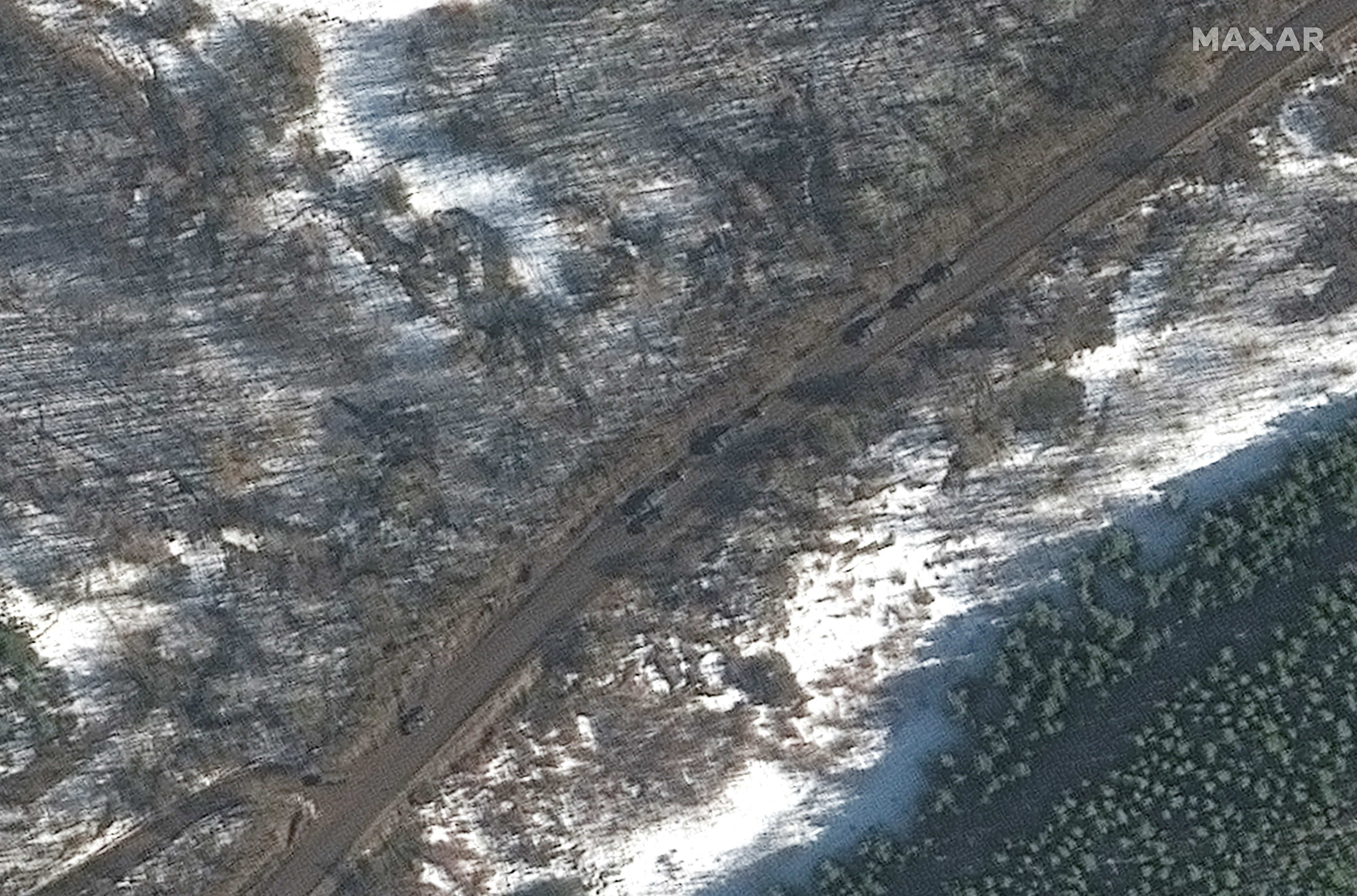 A satellite image shows towed artillery in convoy in Golovchino