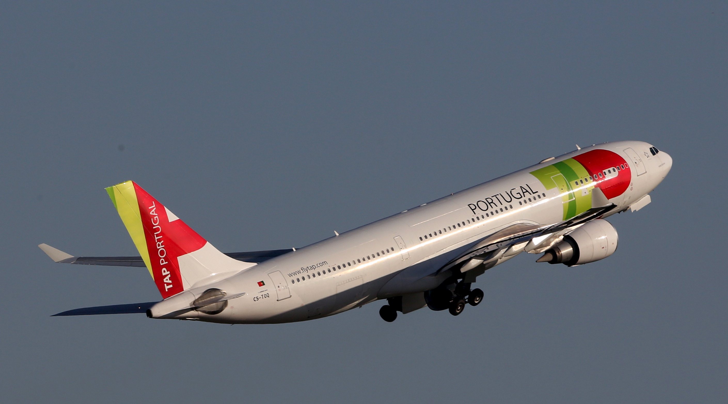 A TAP Airbus A330 plane departs Guarulhos international airport in Sao Paulo