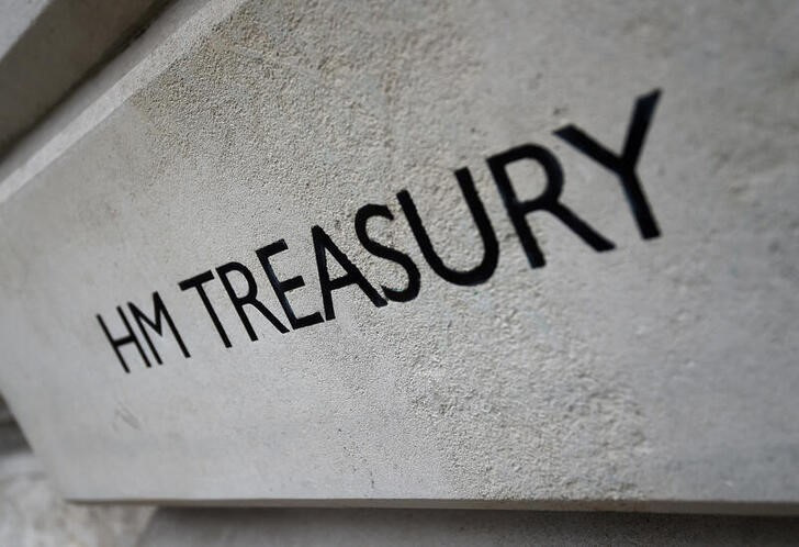 The HM Treasury name is seen painted on the outside of Britain's Treasury building in central London