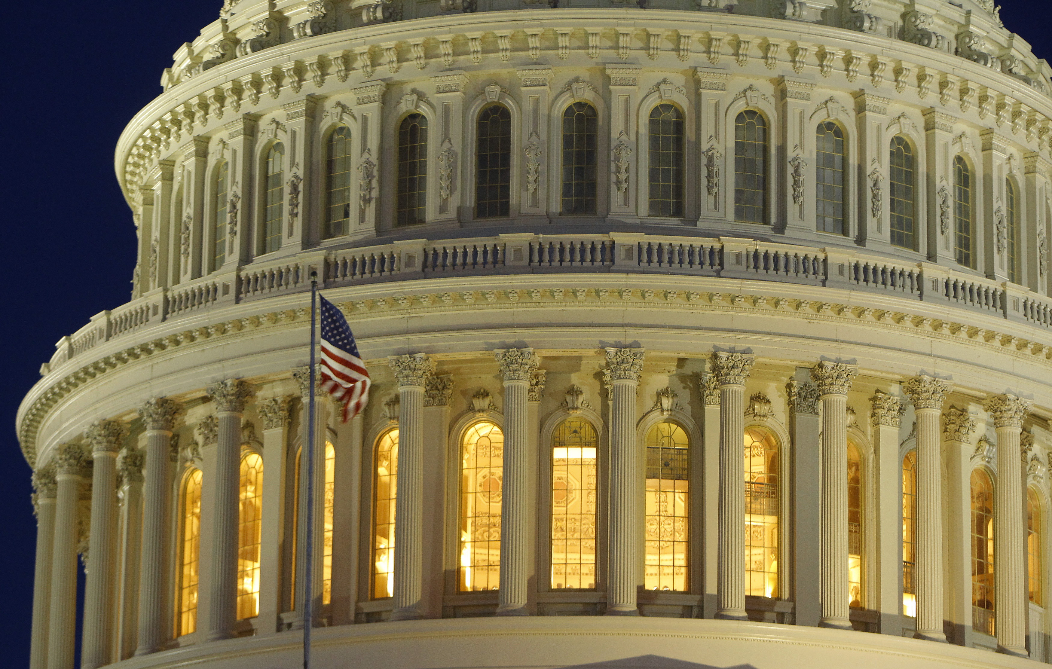The United States Capitol Dome is seen before dawn in Washington