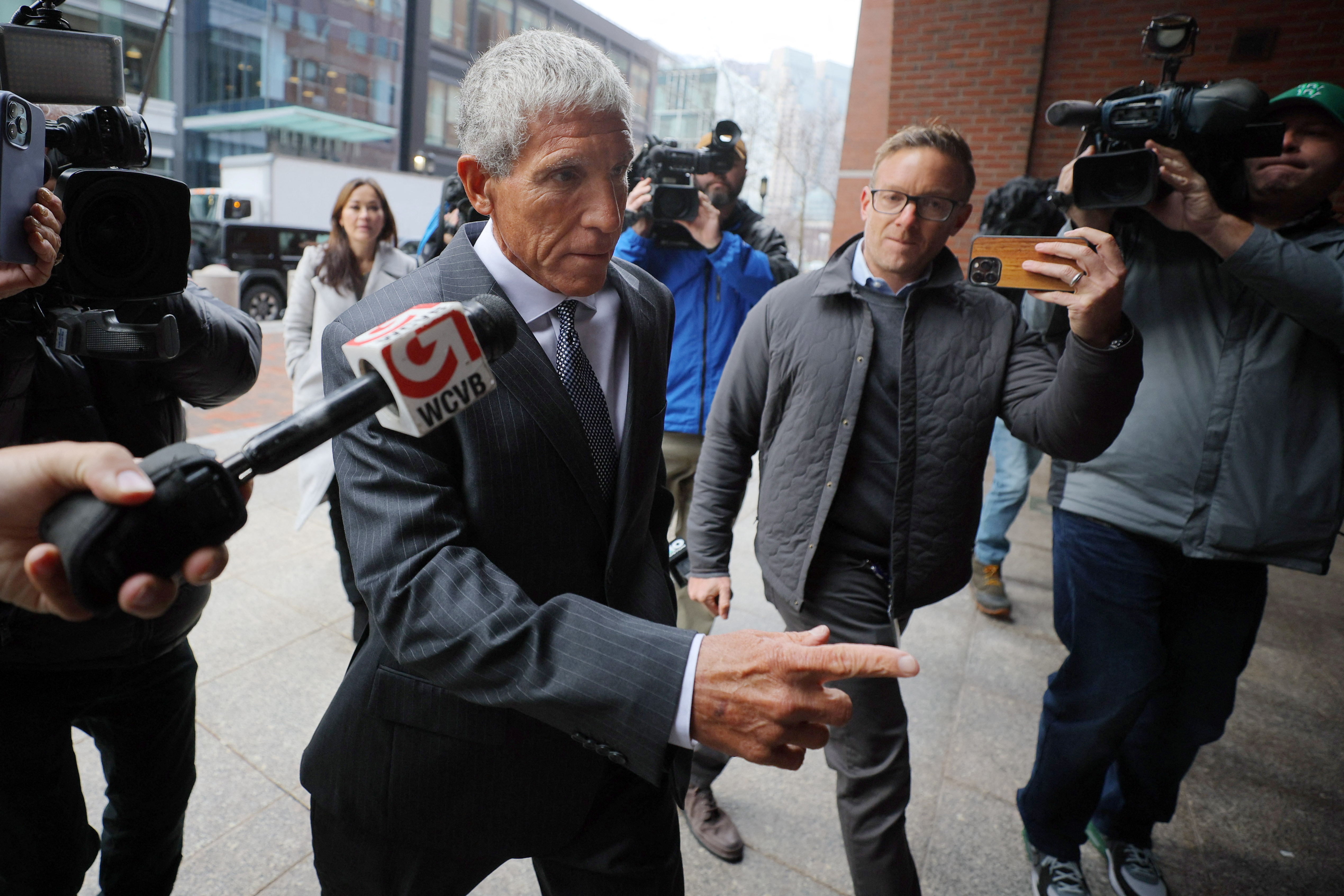 Varsity Blues mastermind Rick Singer arrives at the federal courthouse in Boston
