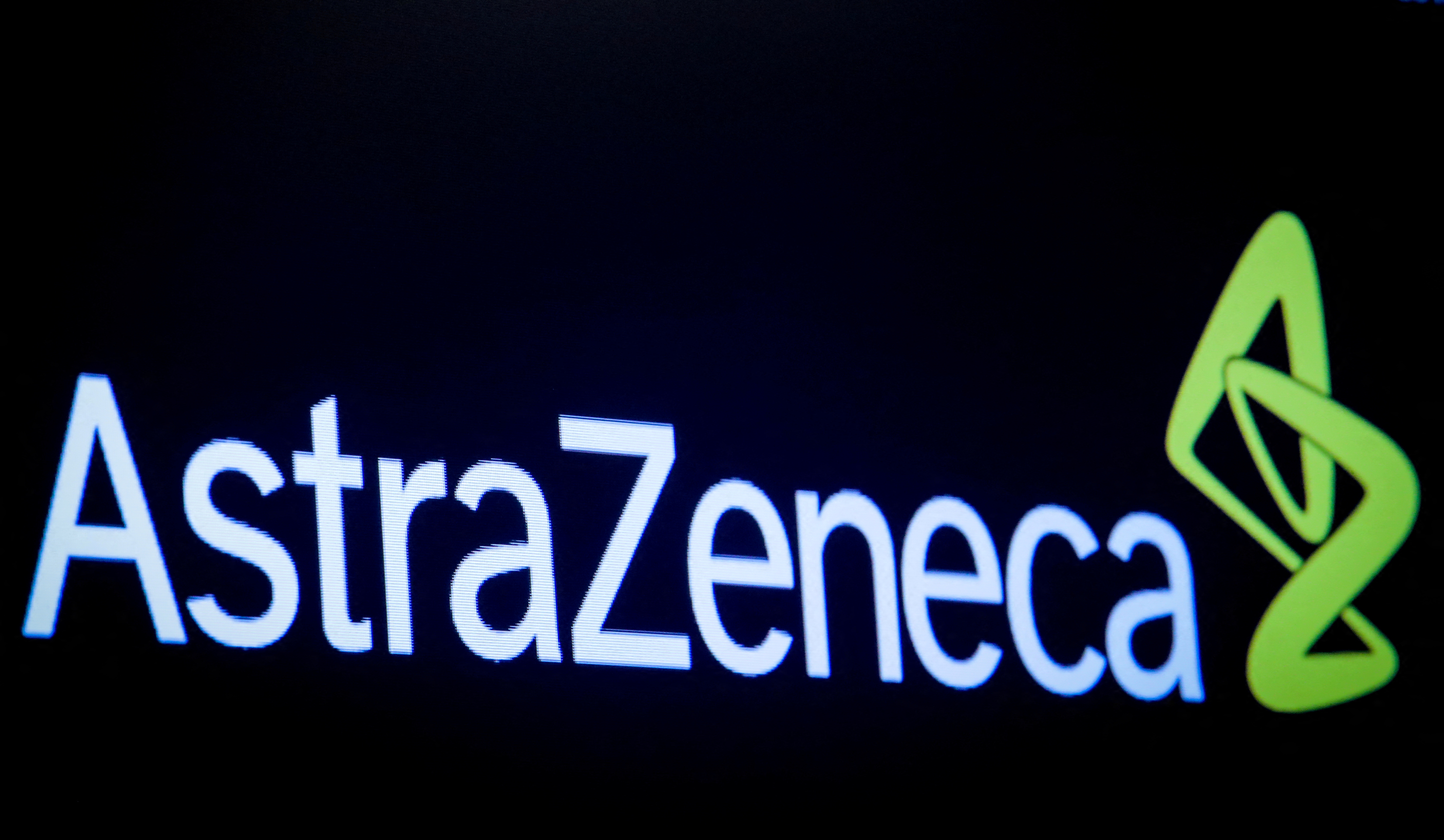 The company logo for pharmaceutical company AstraZeneca is displayed on a screen on the floor at the NYSE in New York, United States