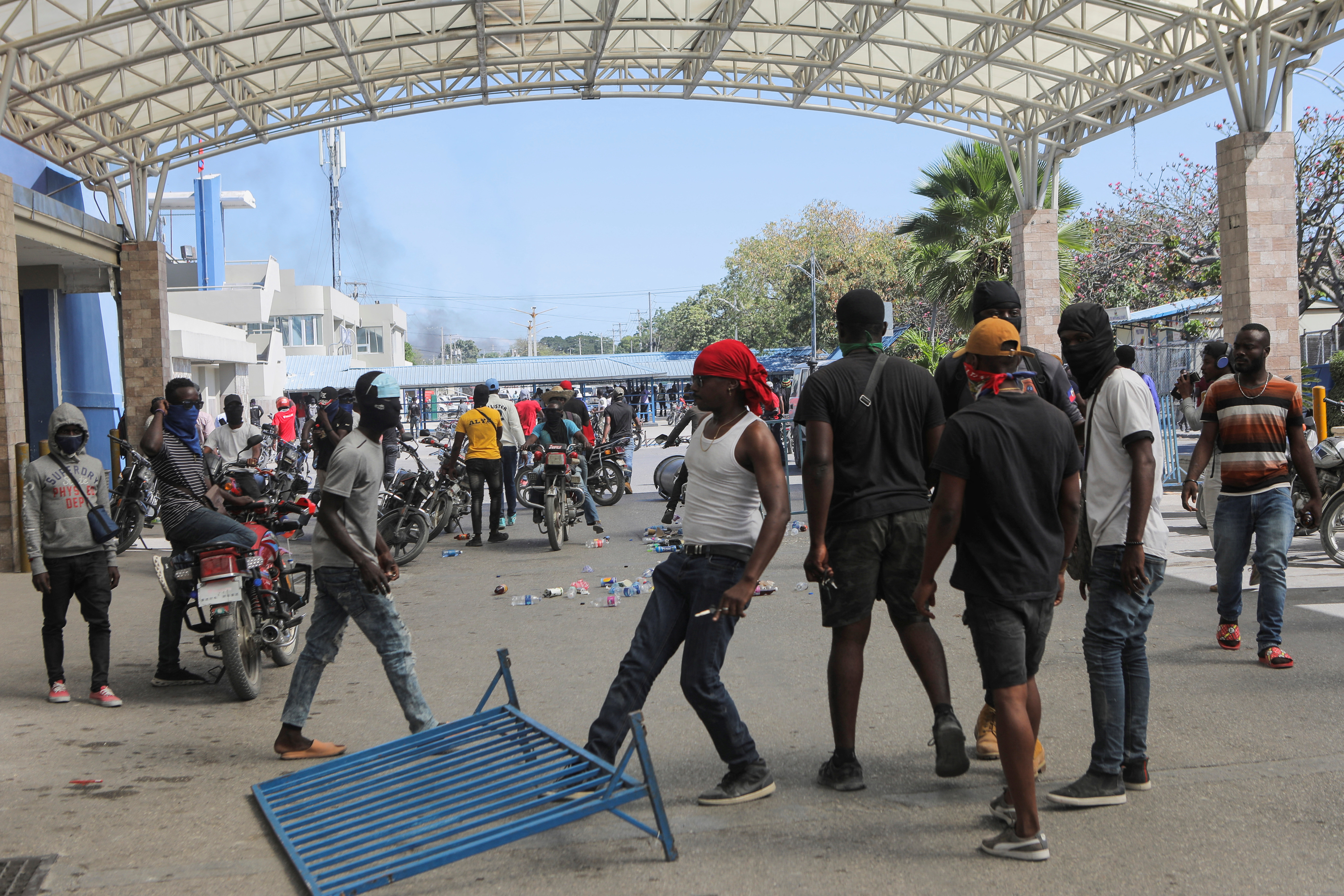 Demonstrators break into the Toussaint Louverture International Airport to protest the recent killings of police officers by armed gangs, in Port-au-Prince
