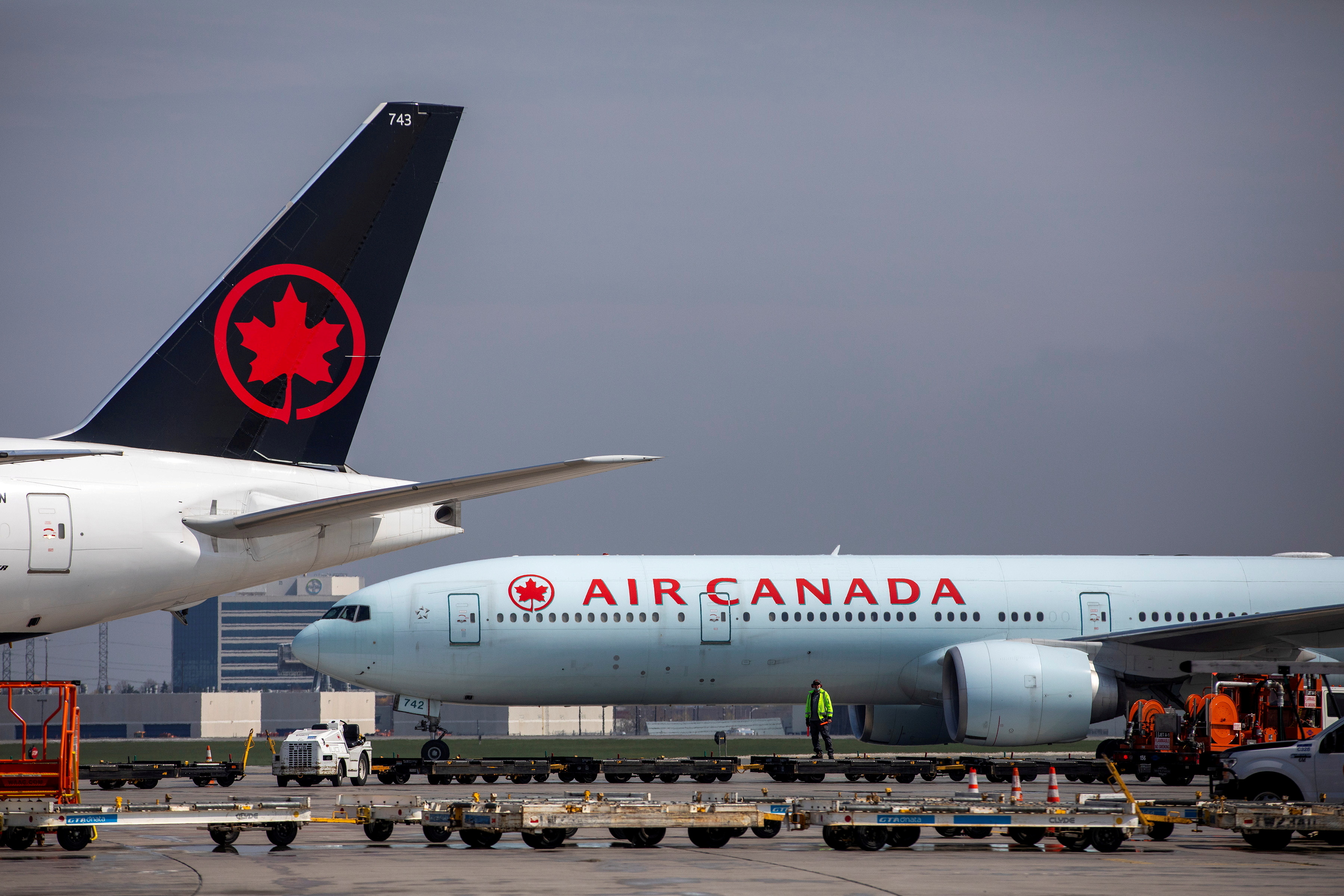 Air Canada planes are parked at Toronto Pearson Airport in Mississauga, Ontario, Canada April 28, 2021. REUTERS/Carlos Osorio/File Photo