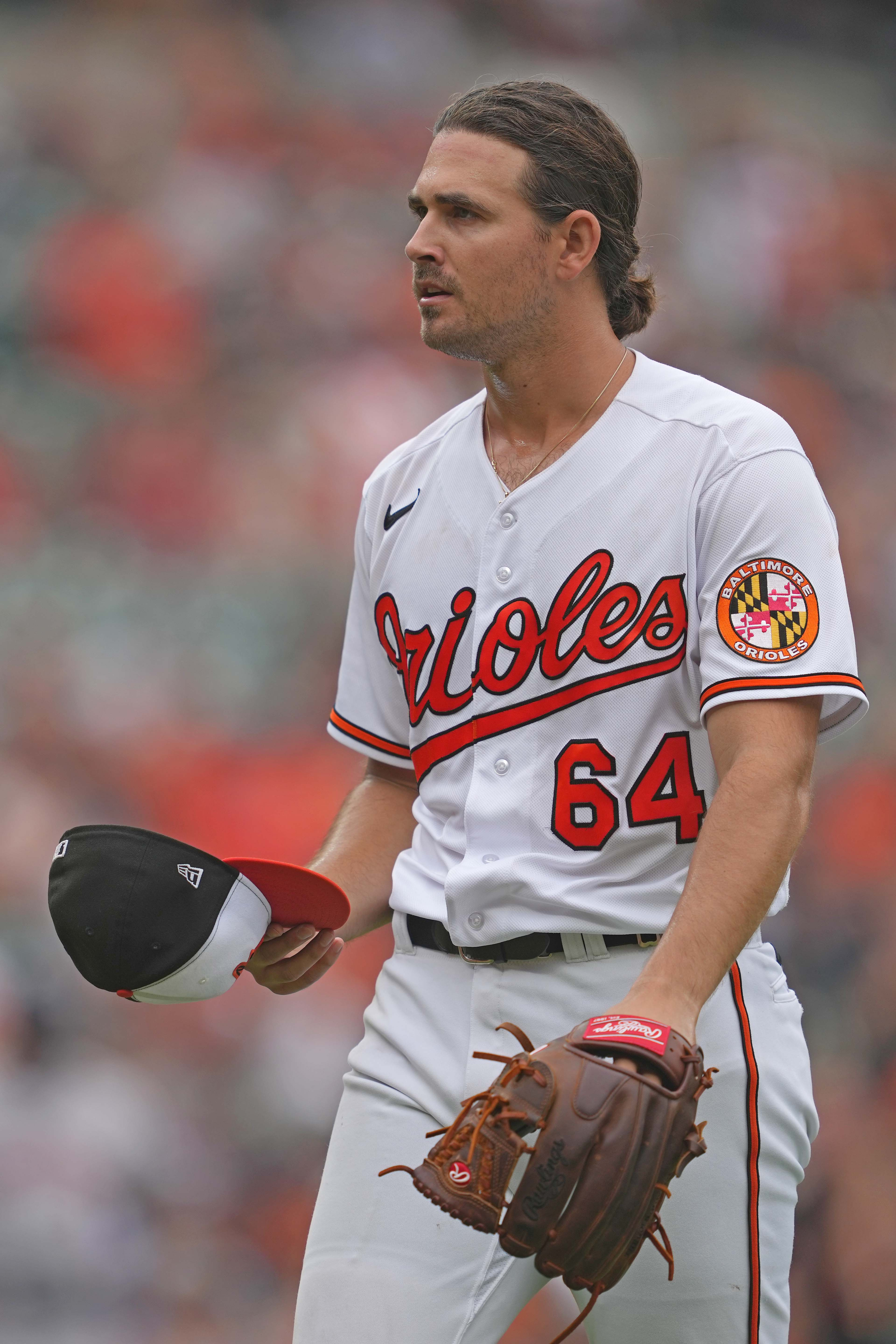 Baltimore Orioles pitcher Dean Kremer, right, is congratulated by catcher  Adley Rutschman after pitching a 6-0 shutout against the Houston Astros in  a baseball game, Friday, Sept. 23, 2022, in Baltimore. (AP