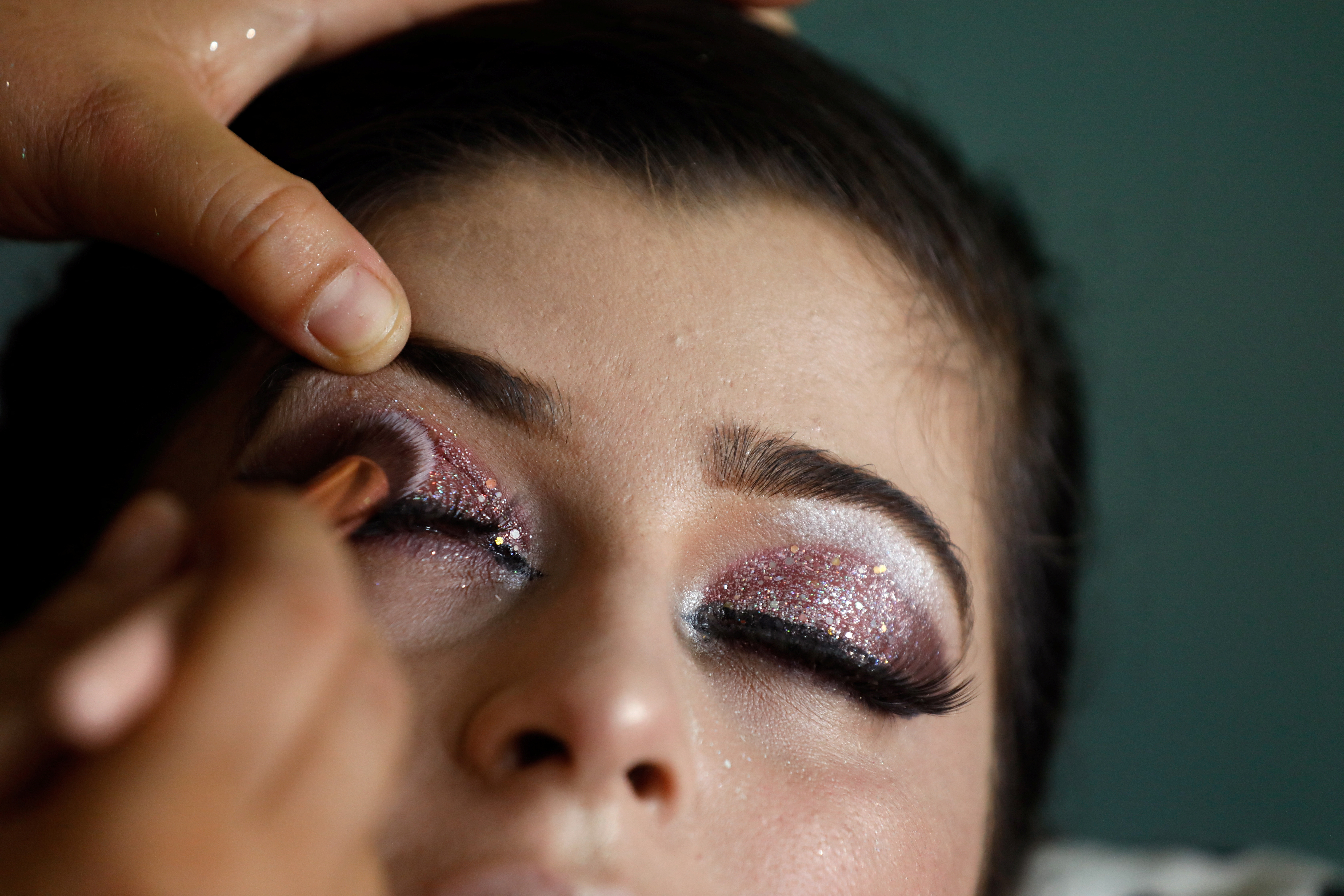 Afghan woman attends beautician and makeup class at the Skills Academy for Needy Aspirants, in Peshawar