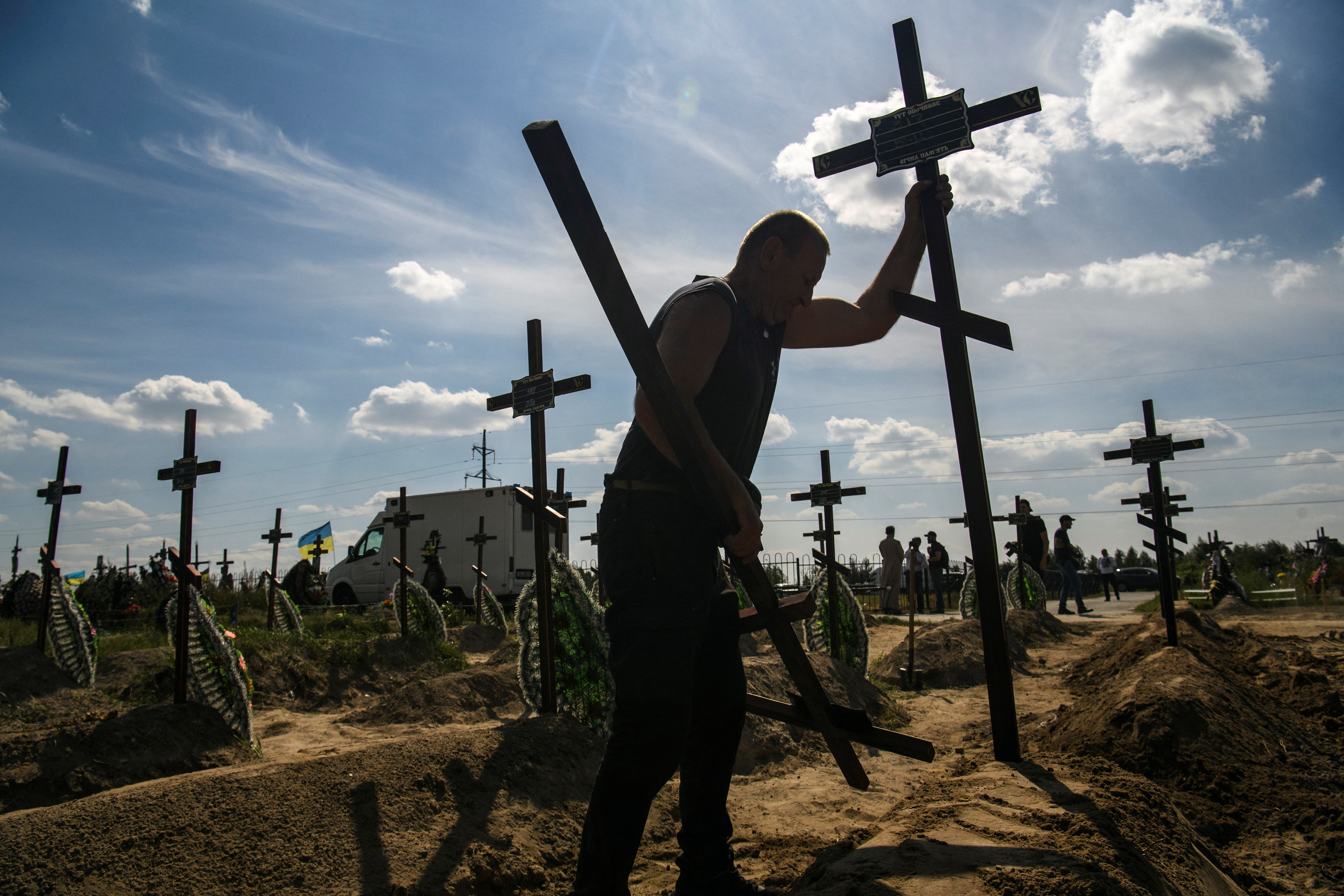 Mass burial of unidentified people killed during Russian invasion in Bucha