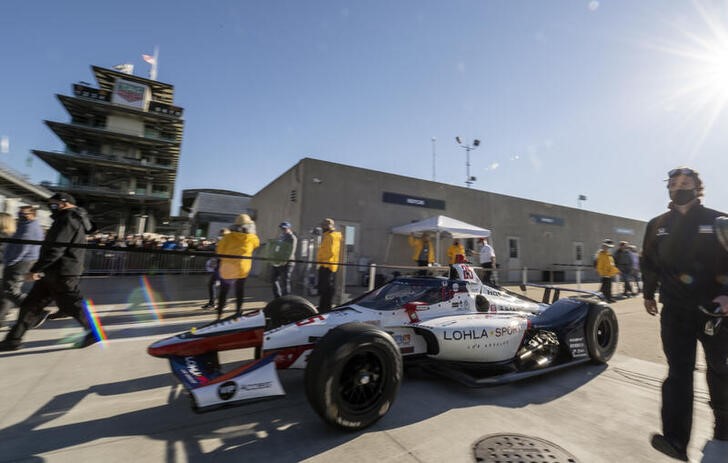 May 30, 2021; Indianapolis, Indiana, USA; The car of Andretti Autosport driver Stefan Wilson (25) is pulled into the pits before the 105th running of the Indianapolis 500 at Indianapolis Motor Speedway. Mandatory Credit: Marc Lebryk-USA TODAY Sports