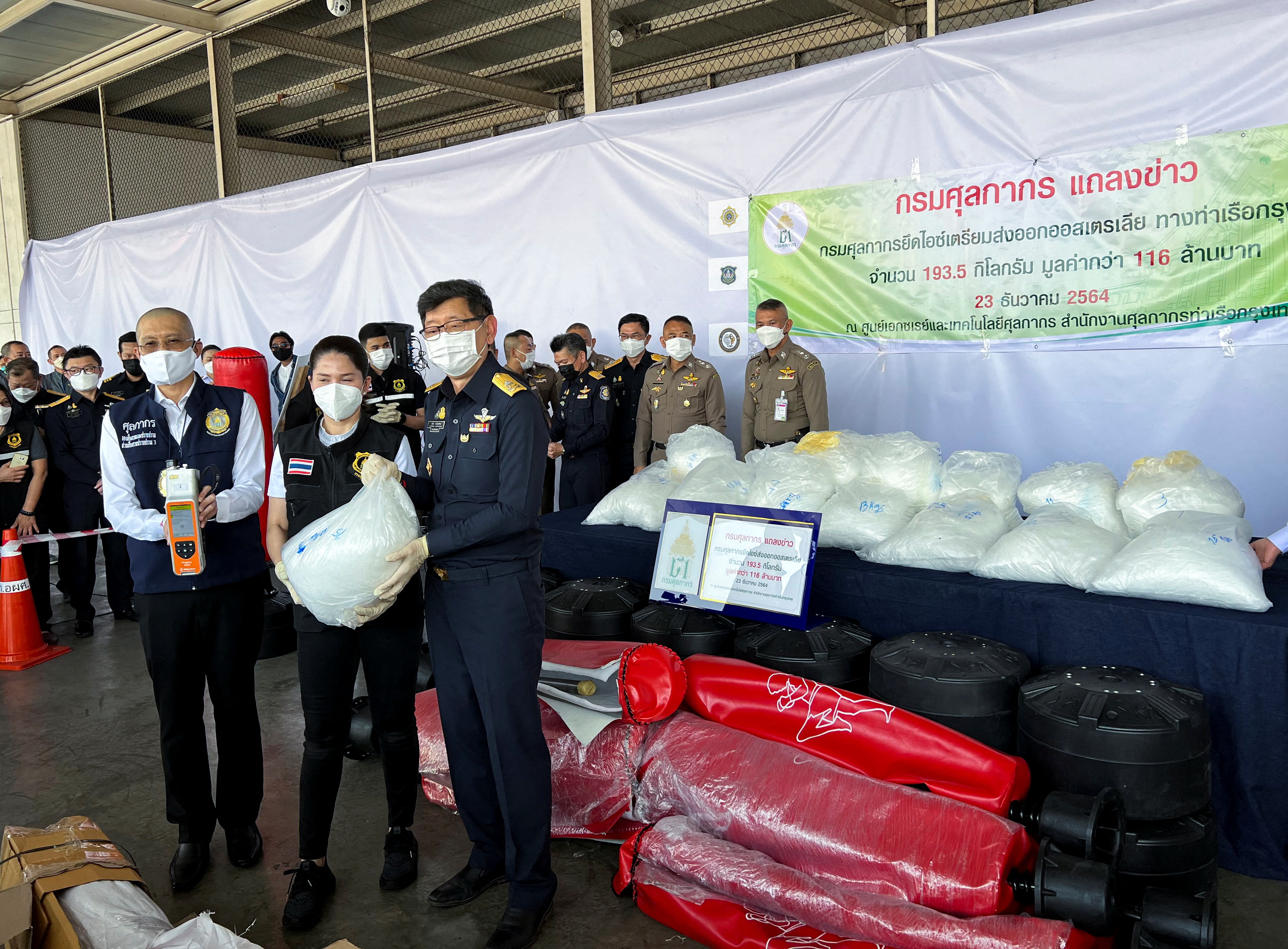 Officials show amphetamine seized in a Thailand port, in Bangkok