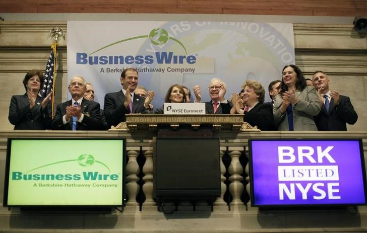 Cathy Baron Tamraz, president and chief executive officer of Business WireBerkshire Hathaway Chairman Warren Buffett tours the floor of the New York Stock Exchange