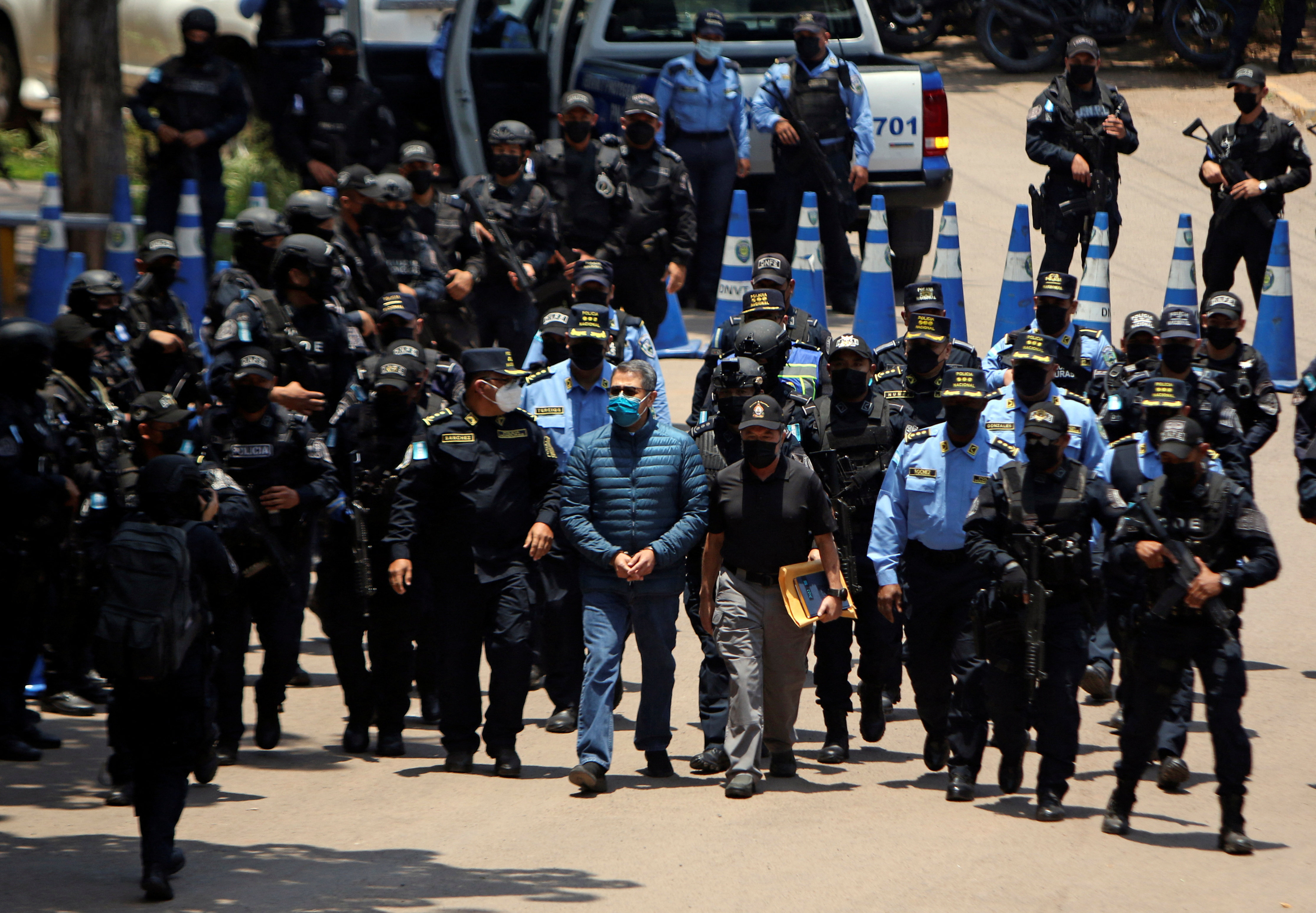 Honduras extradite former President Juan Orlando Hernandez is being transported to the U.S., in Tegucigalpa