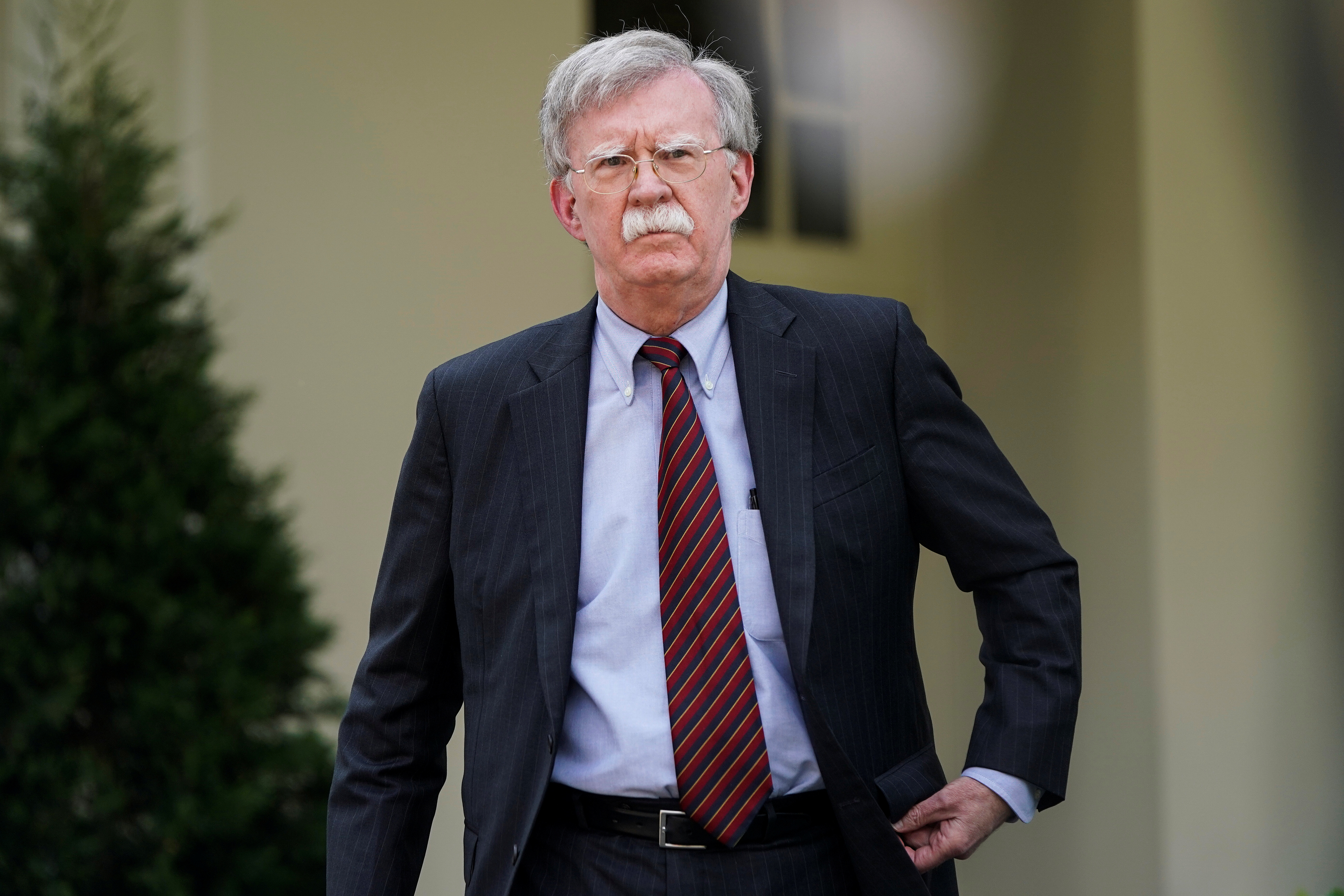 White House national security adviser Bolton arrives to speak about the political unrest in Venezuela, outside the White House in Washington