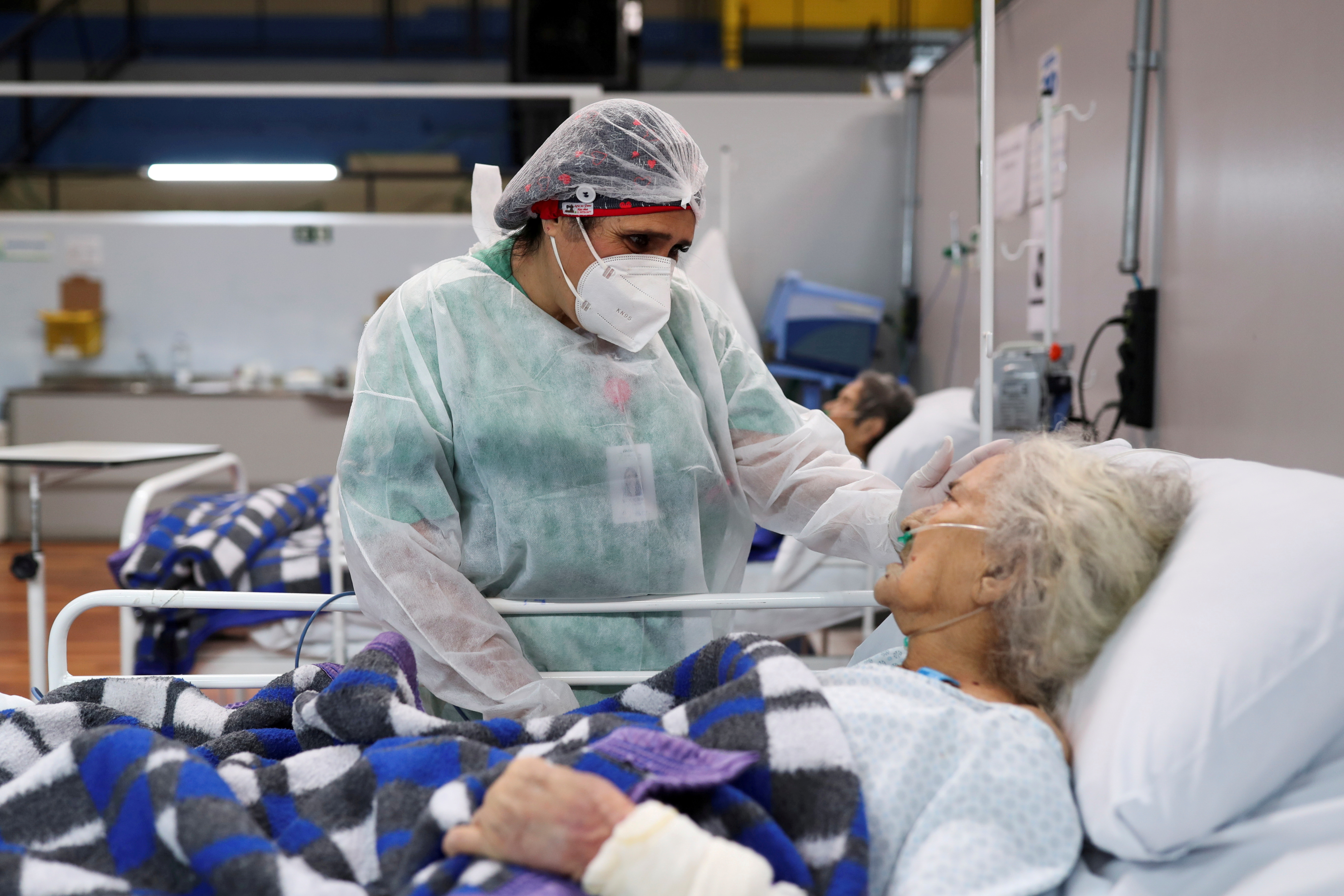 Brazil hospitals pushed to limit as COVID-19 death toll soars | Reuters