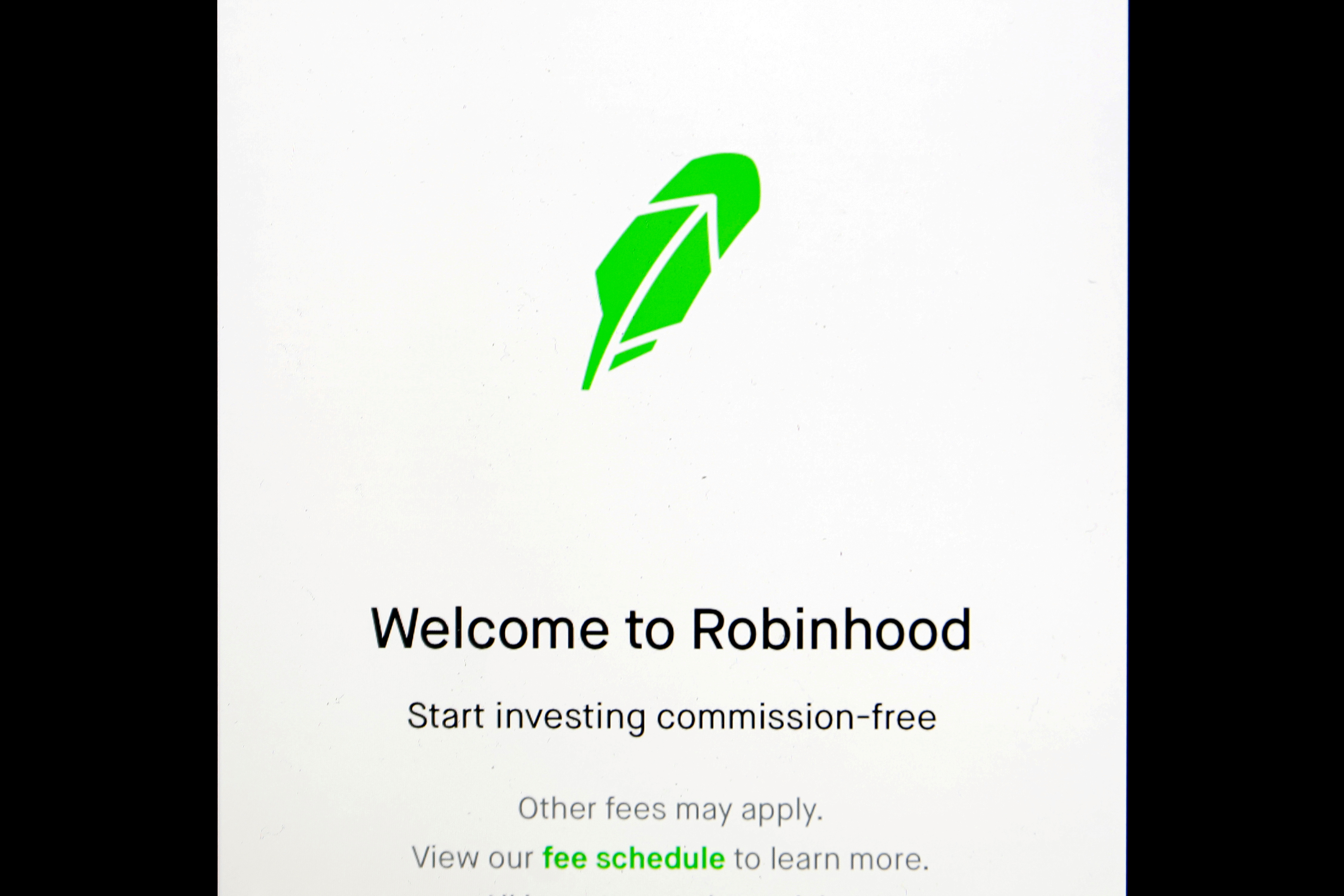 The welcome screen for the Robinhood App is displayed on a screen in this photo illustration January 29, 2021. REUTERS/Brendan McDermid/Illustration/File Photo
