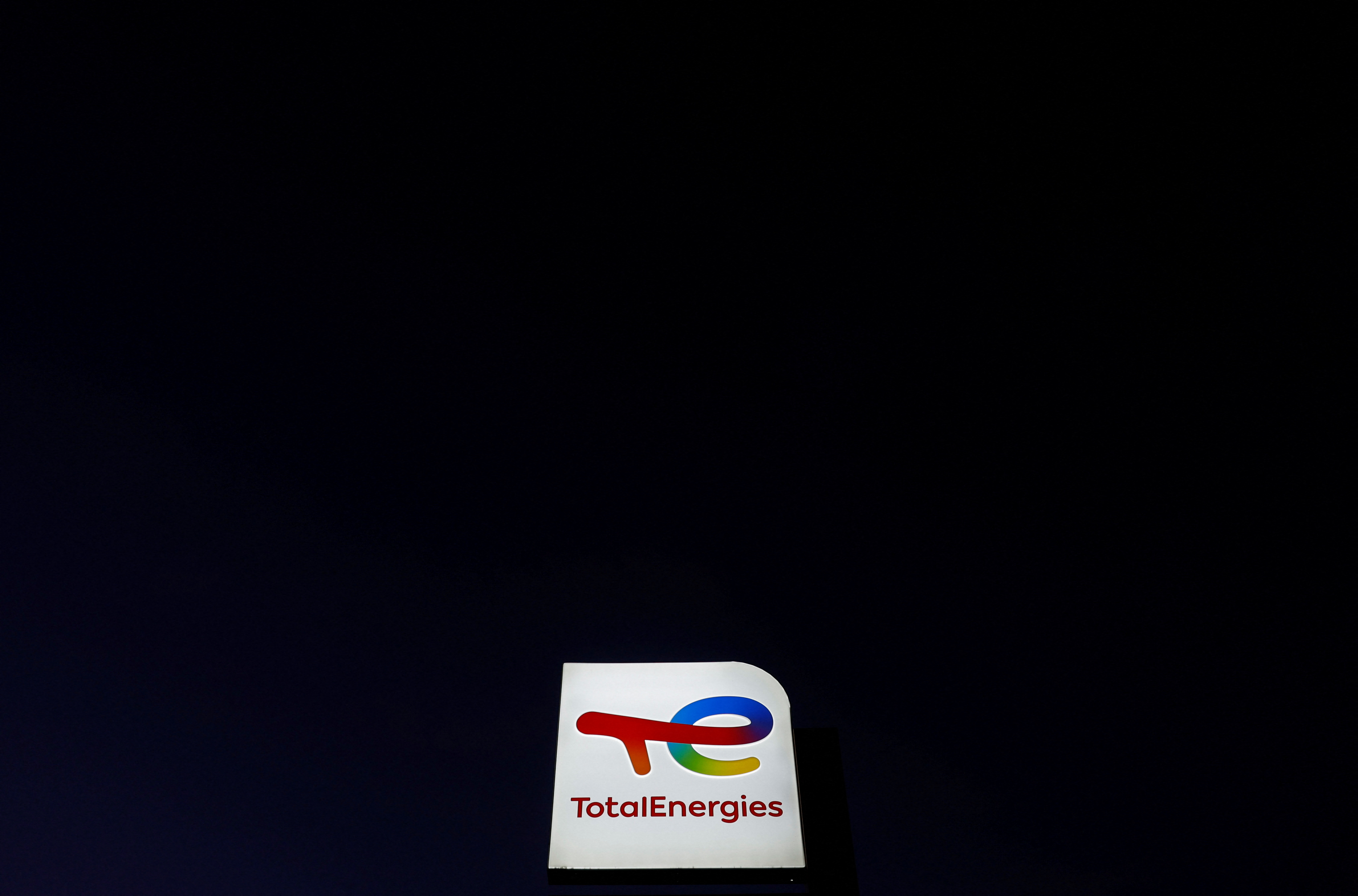 A sign with the logo of French oil and gas company TotalEnergies is pictured at a petrol station in Reze