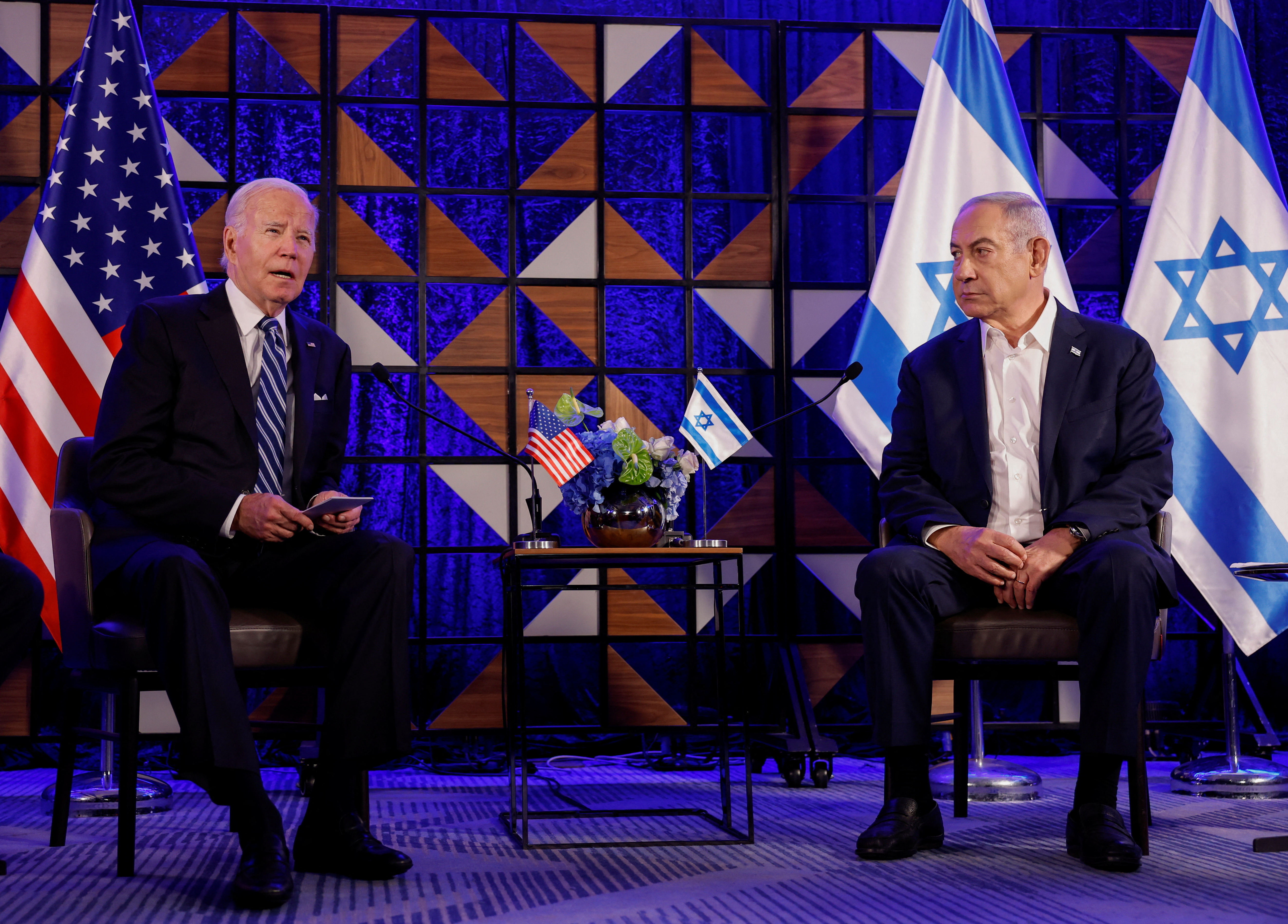 Biden lands in Israel, hugs Netanyahu and Herzog on tarmac | Reuters