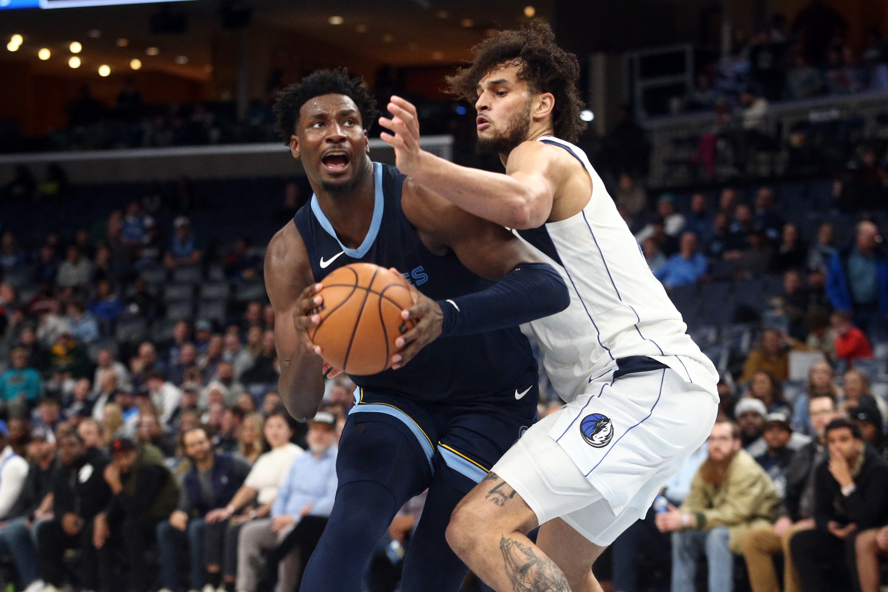 Luka Doncic, Mavericks hold off Grizzlies | Reuters