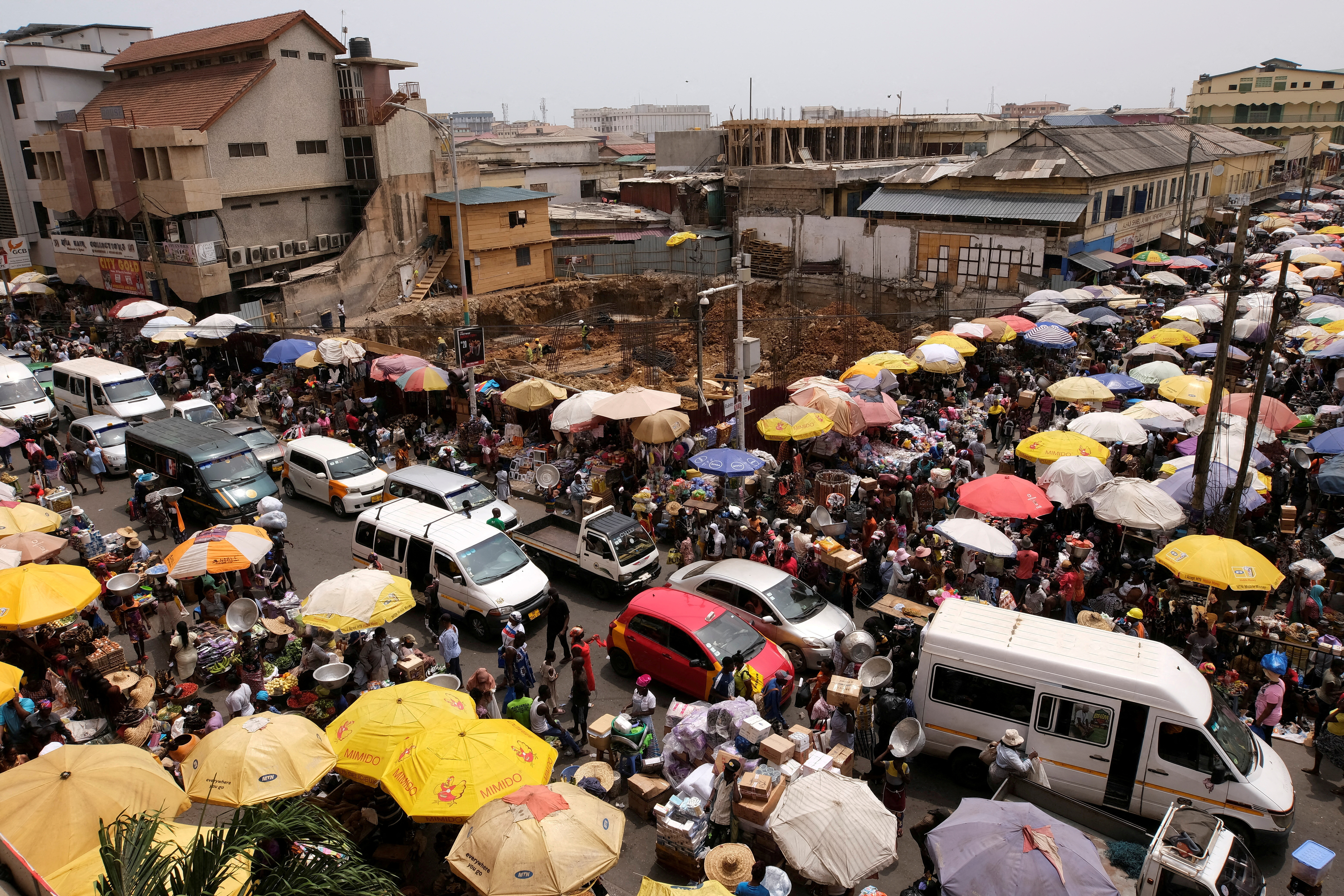 FILE PHOTO: People make trade in Accra