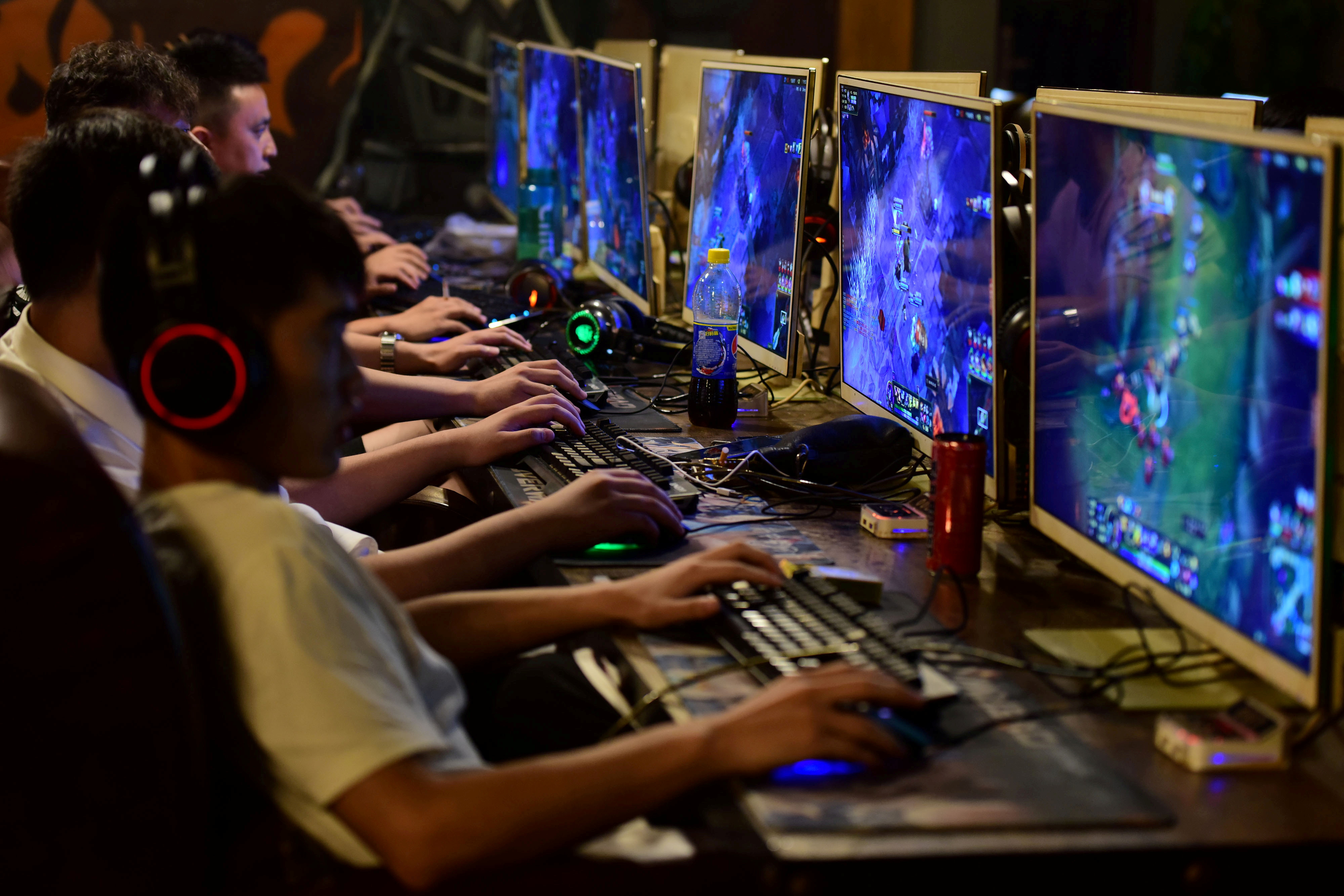 Three hours a week: Play time's over for China's young video gamers | Reuters