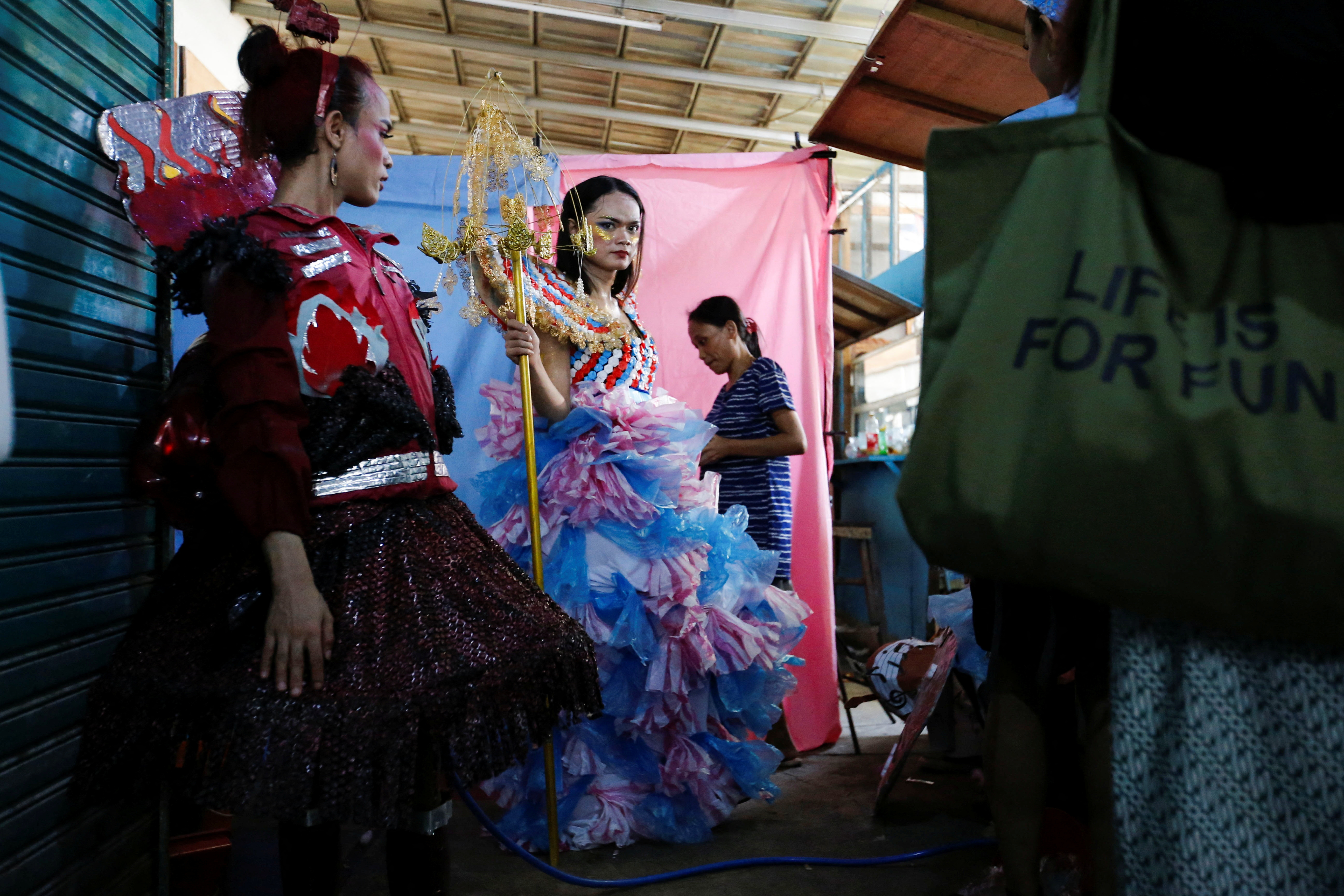 Indonesian transgender models shine spotlight on pollution with plastic  fashion | Reuters