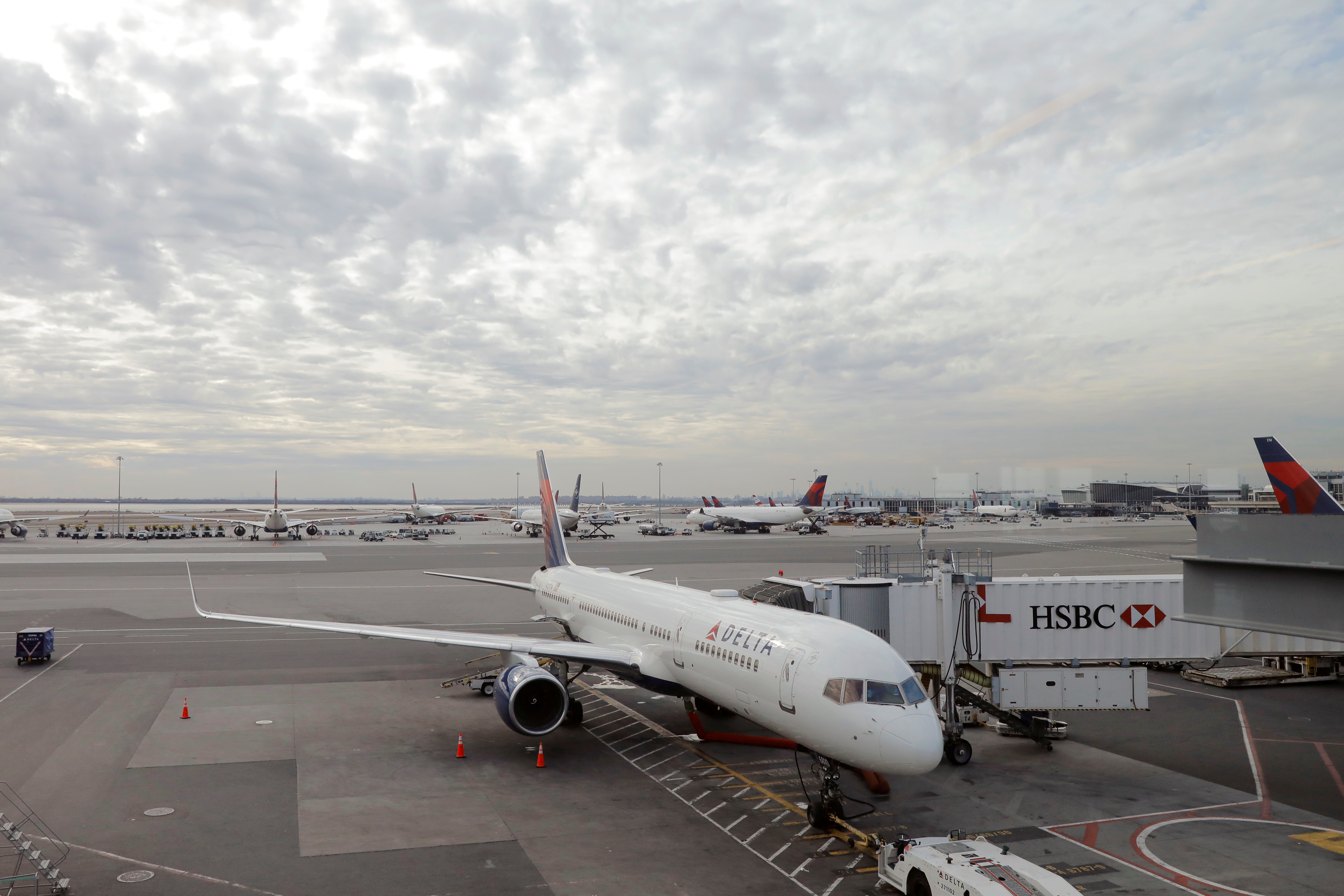 Airplanes are parked on the tarmac at John F Kennedy International Airport in New York