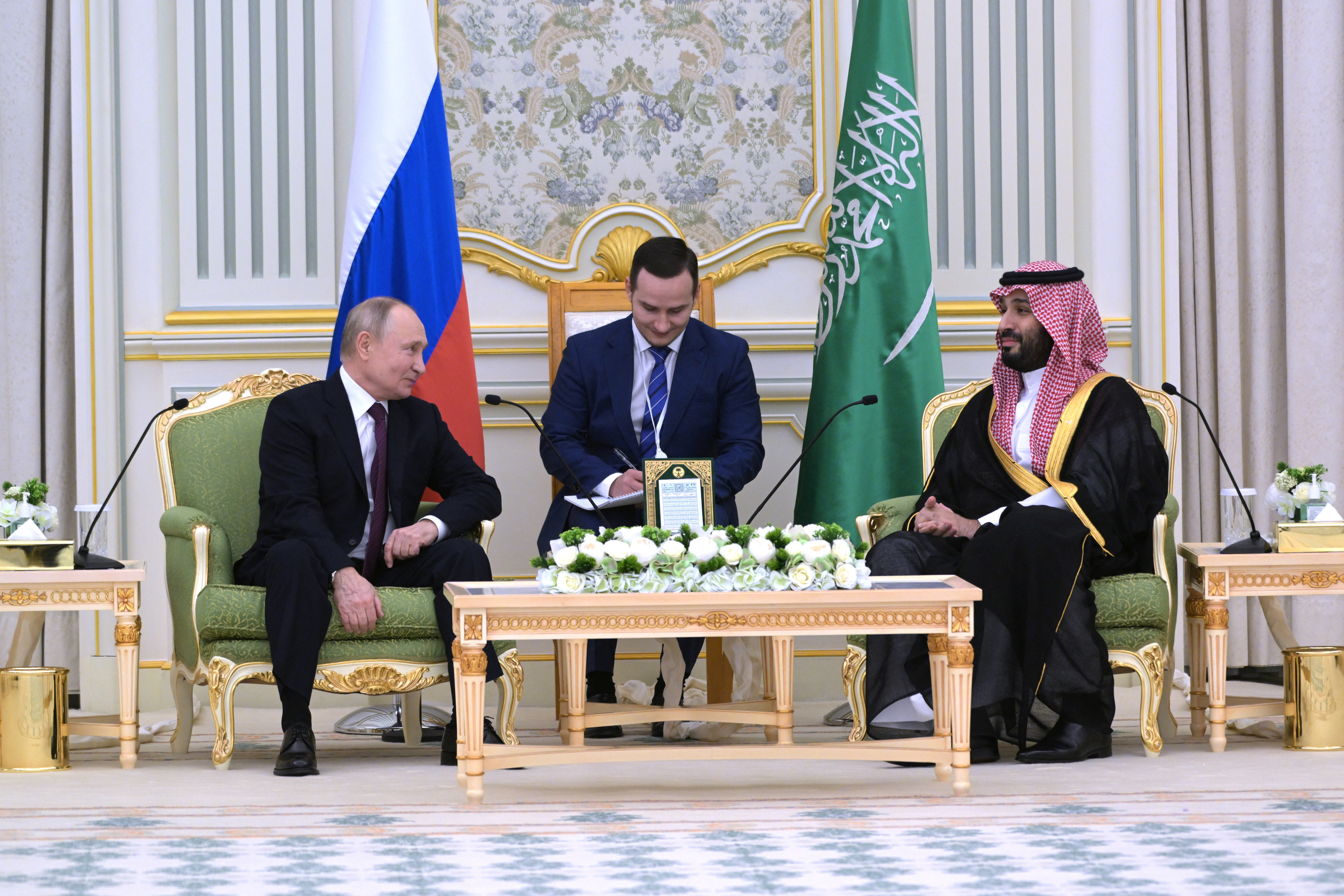 Russian President Vladimir Putin and Saudi Crown Prince Mohammed bin Salman attend a meeting in Riyadh