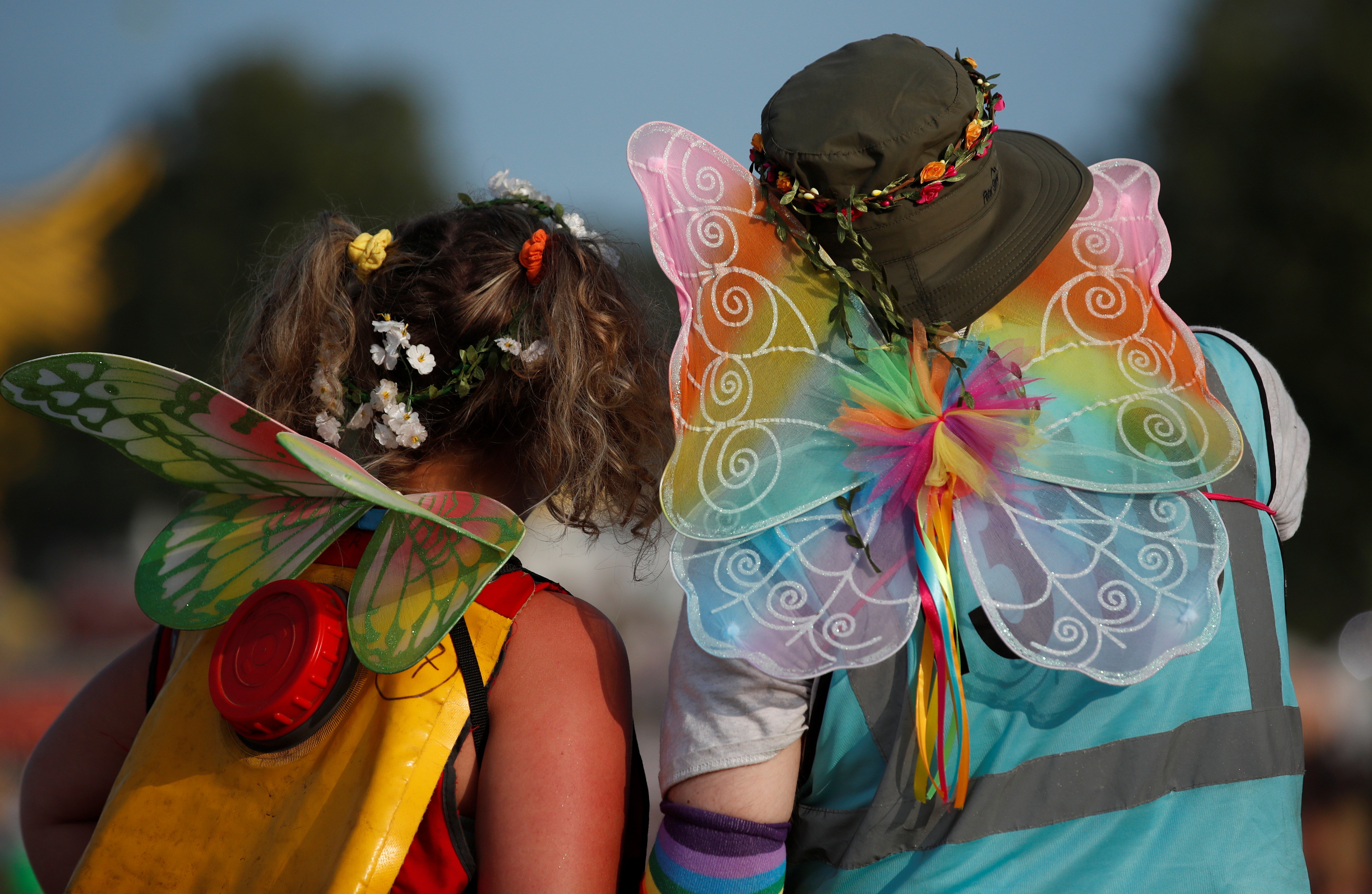 Festivalgoers wear butterfly costumes at Latitude Festival at Henham Park